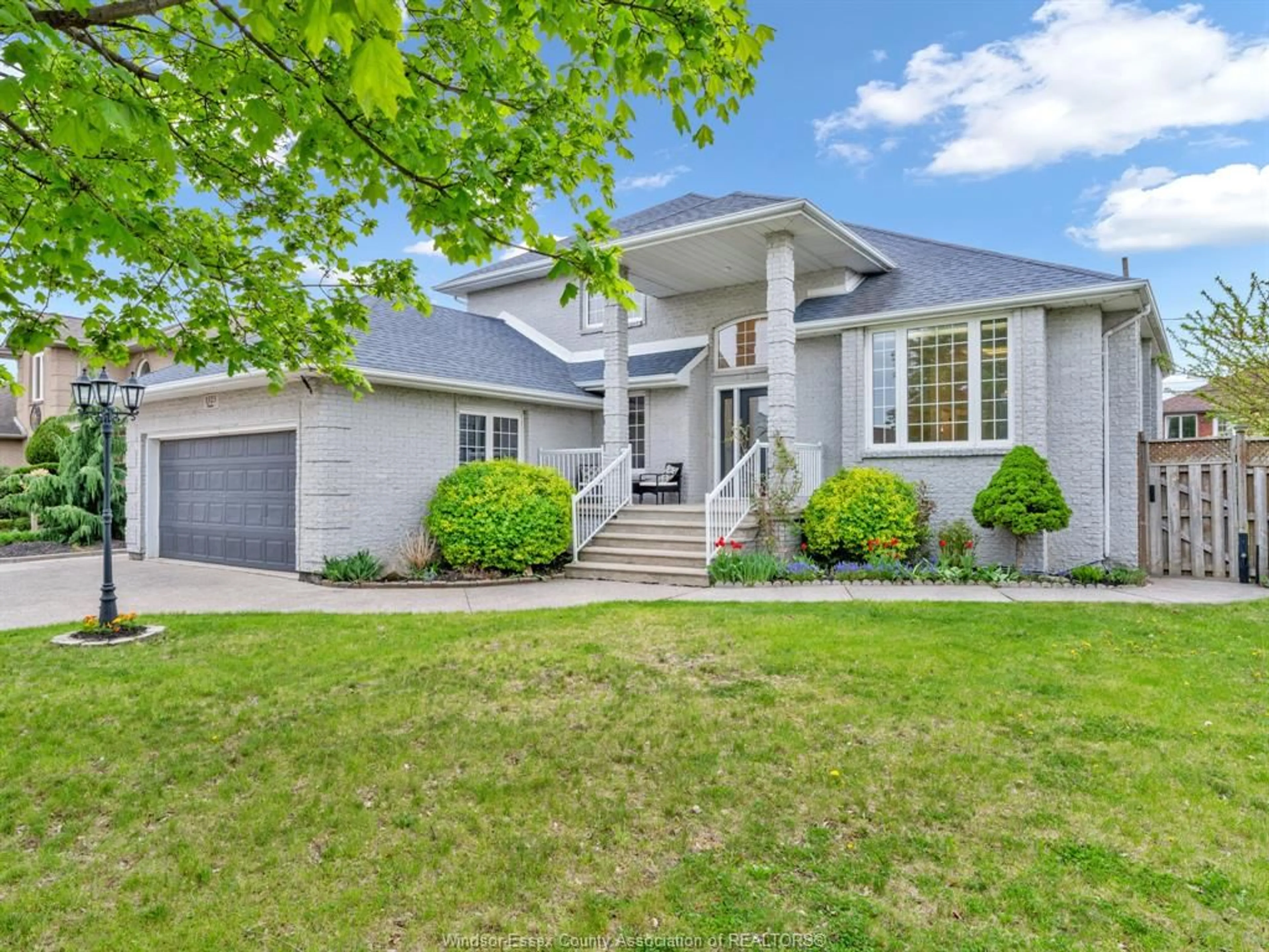 Home with vinyl exterior material, street for 1523 RANKIN Ave, Windsor Ontario N9B 3V2