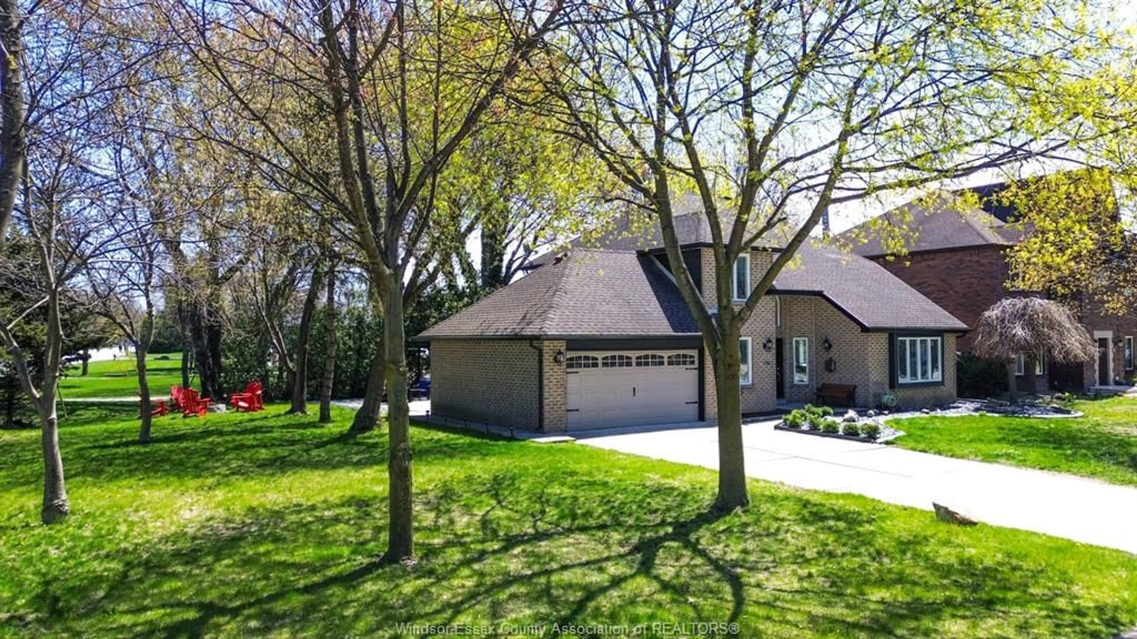 A pic from outside/outdoor area/front of a property/back of a property/a pic from drone, street for 106 MARENTETTE Dr, Lakeshore Ontario N0R 1A0