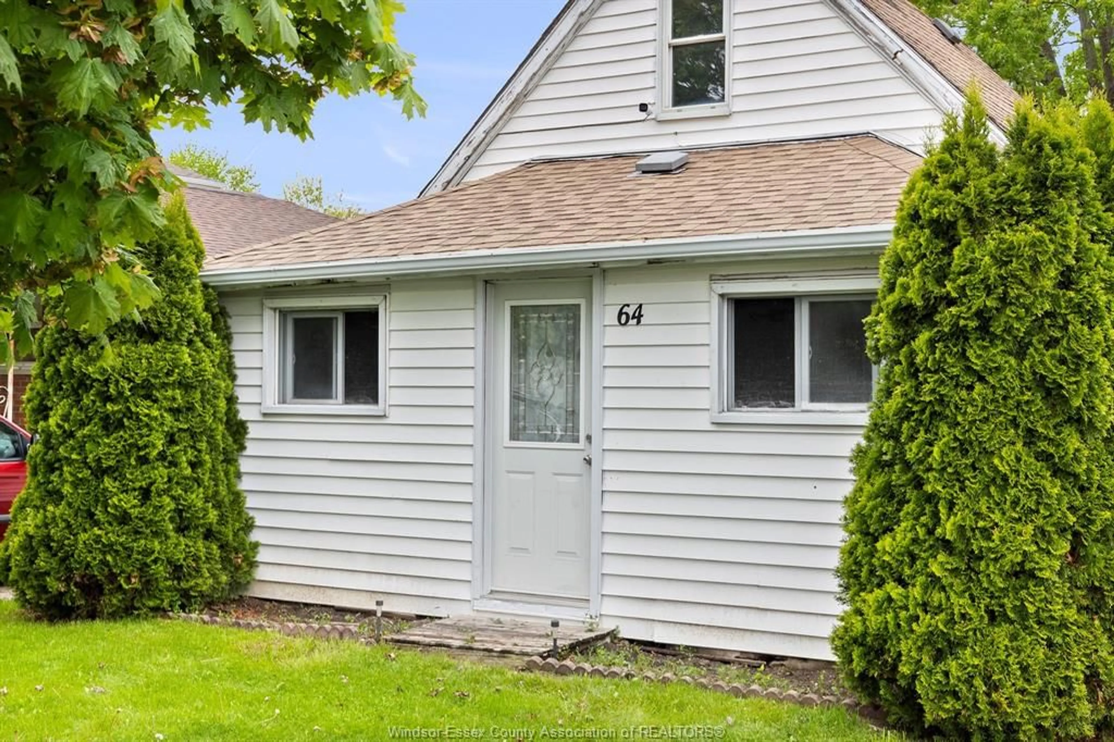 Home with vinyl exterior material, street for 64 CRAWFORD Ave, Tilbury Ontario N0P 2L0