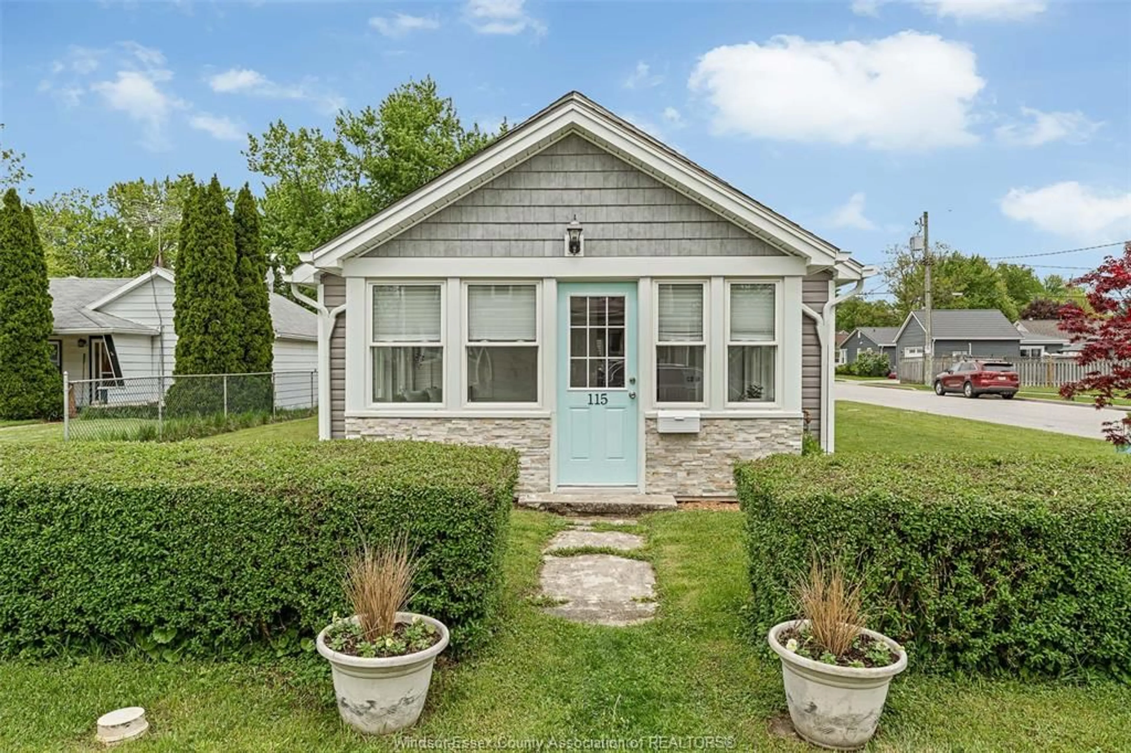 Home with vinyl exterior material, street for 115 LANGTRY, Essex Ontario N8W 1G8