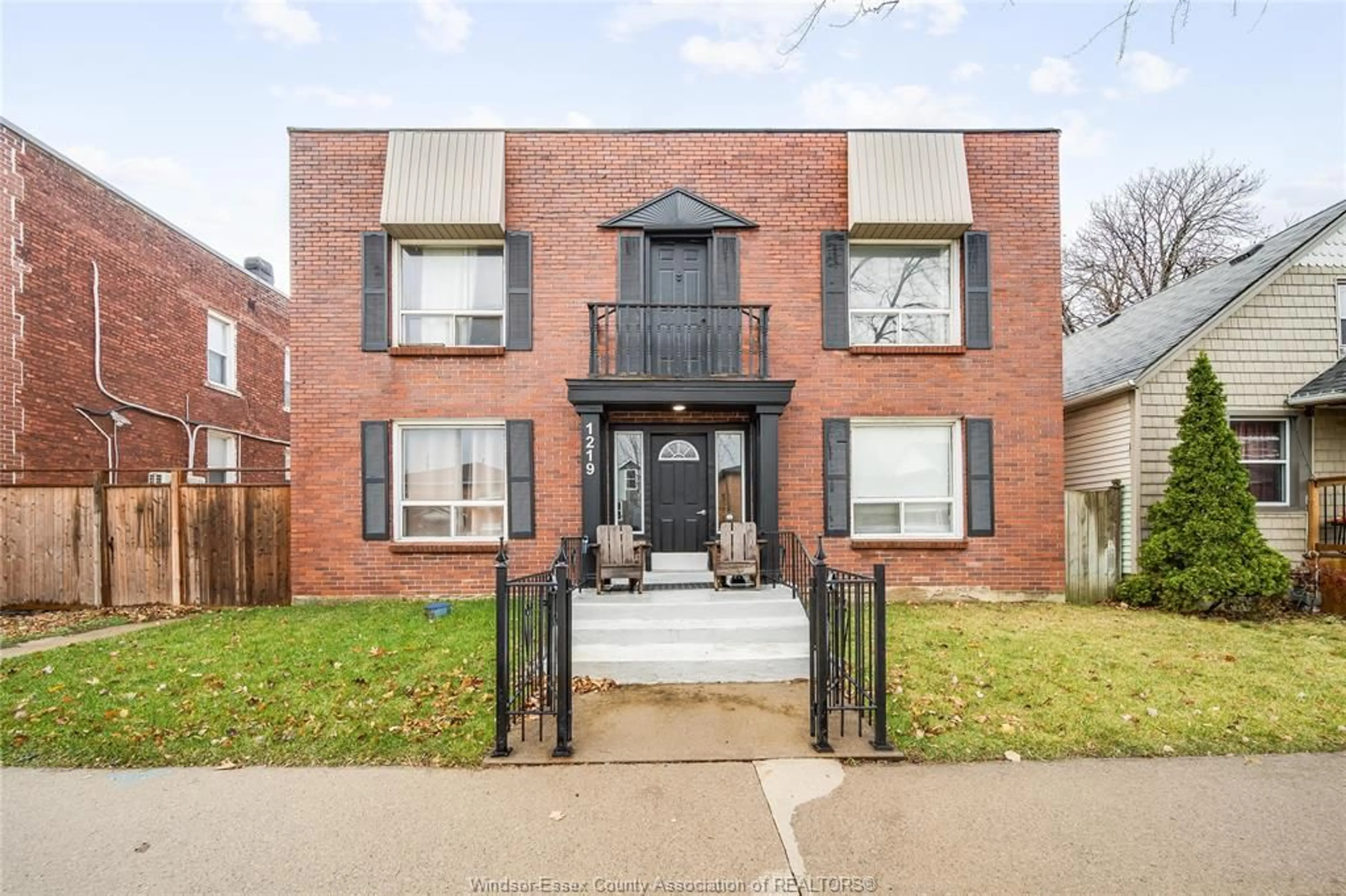 Home with brick exterior material, street for 1219 MONMOUTH, Windsor Ontario N8Y 3M2