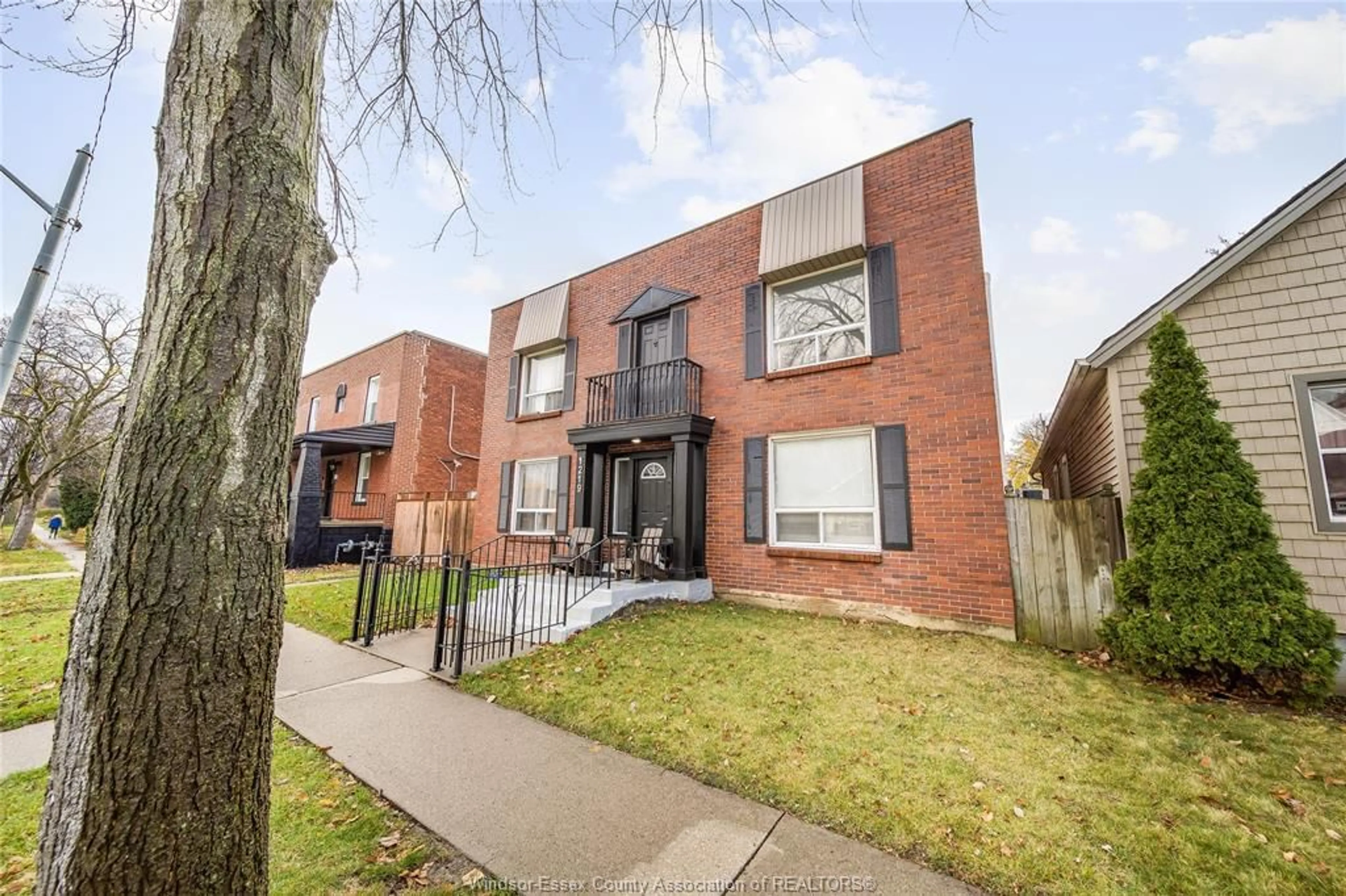 Home with brick exterior material, street for 1219 MONMOUTH, Windsor Ontario N8Y 3M2