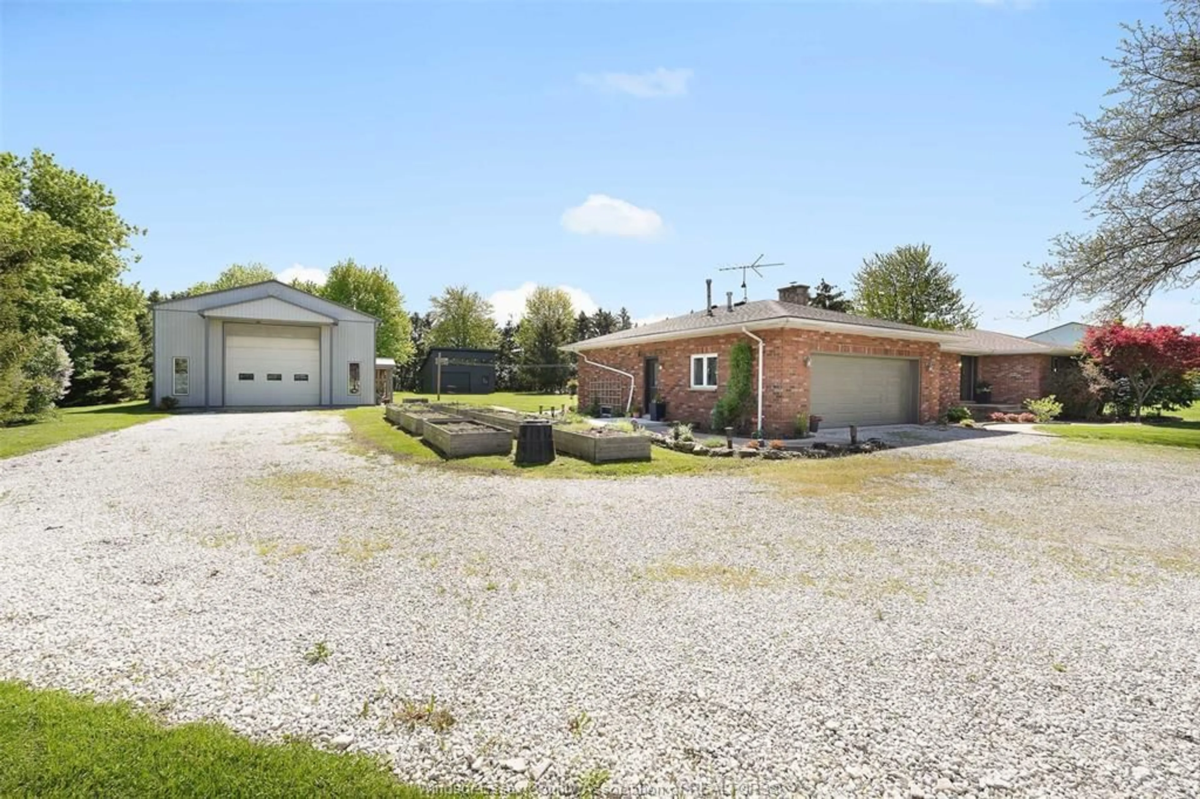 A pic from outside/outdoor area/front of a property/back of a property/a pic from drone, street for 1830 County Rd 27, Lakeshore Ontario N0R 1V0