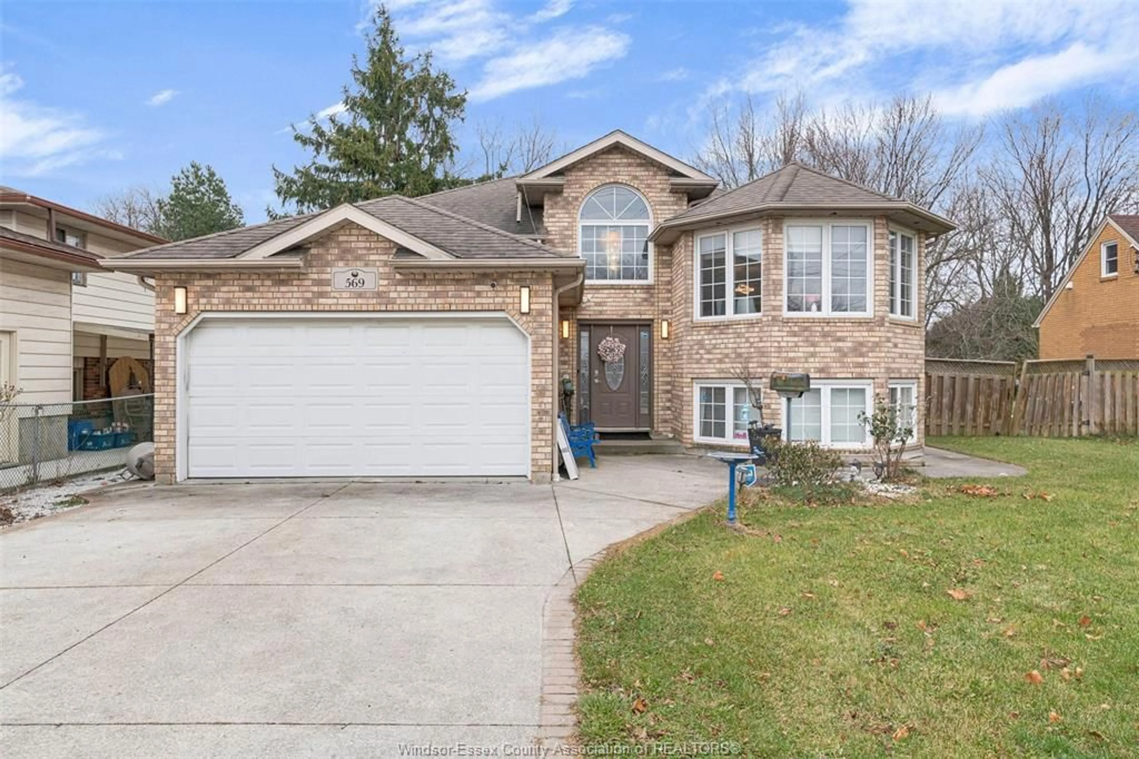 Home with brick exterior material, street for 569 Cabana Rd, Windsor Ontario N9G 1A5