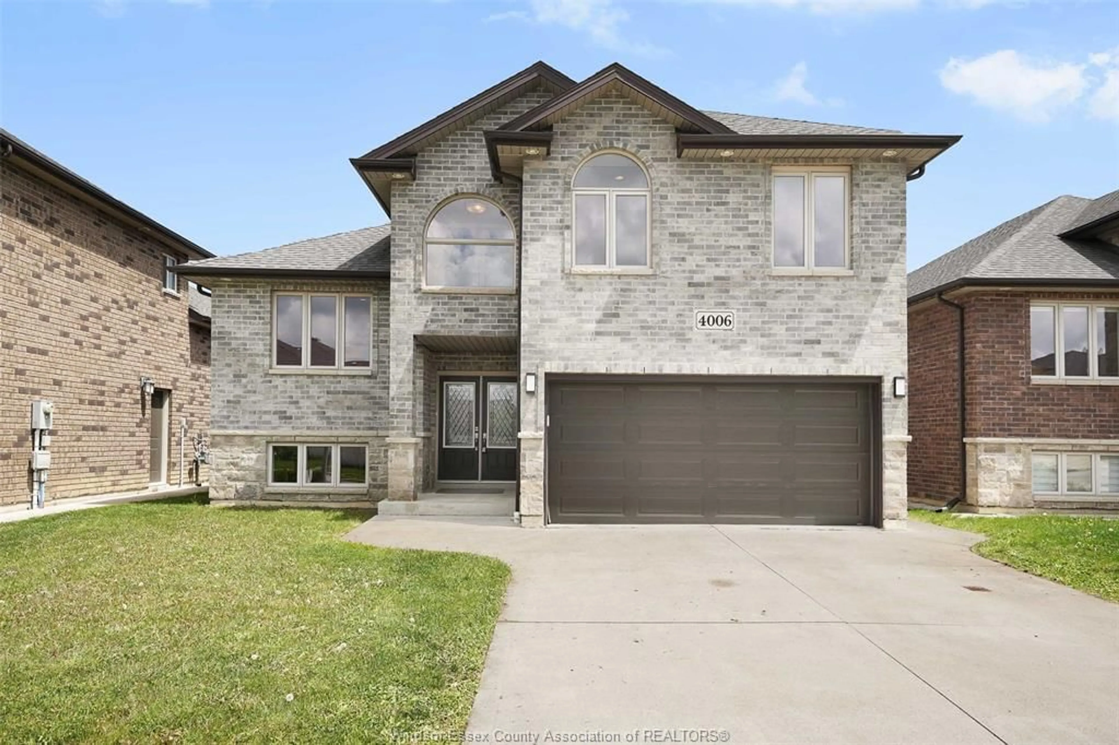 Home with brick exterior material, street for 4006 COSENZA, Windsor Ontario N9G 0A5