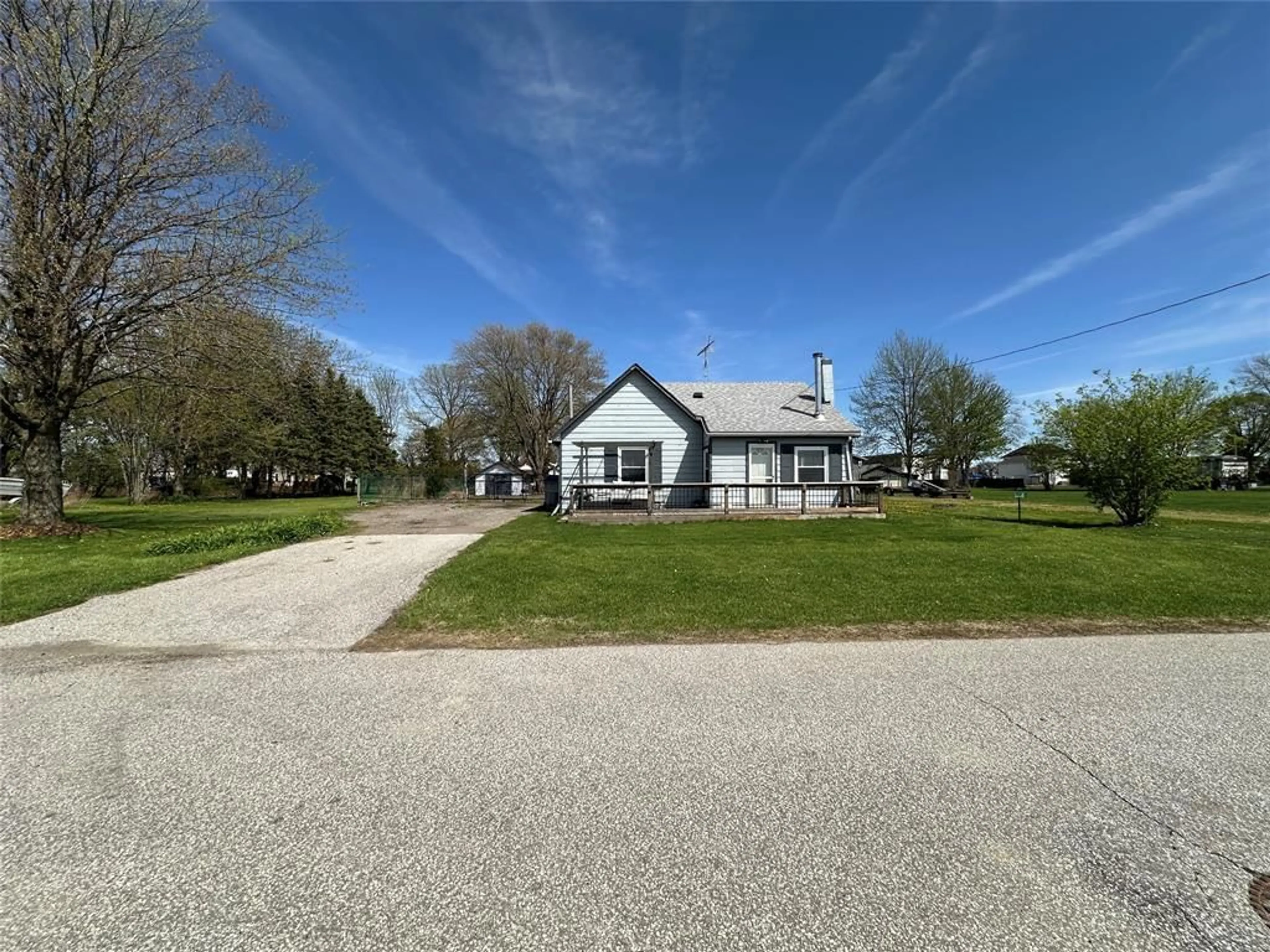 A pic from outside/outdoor area/front of a property/back of a property/a pic from drone, street for 3158 QUEEN St, Brooke-Alvinston Ontario N0N 1K0