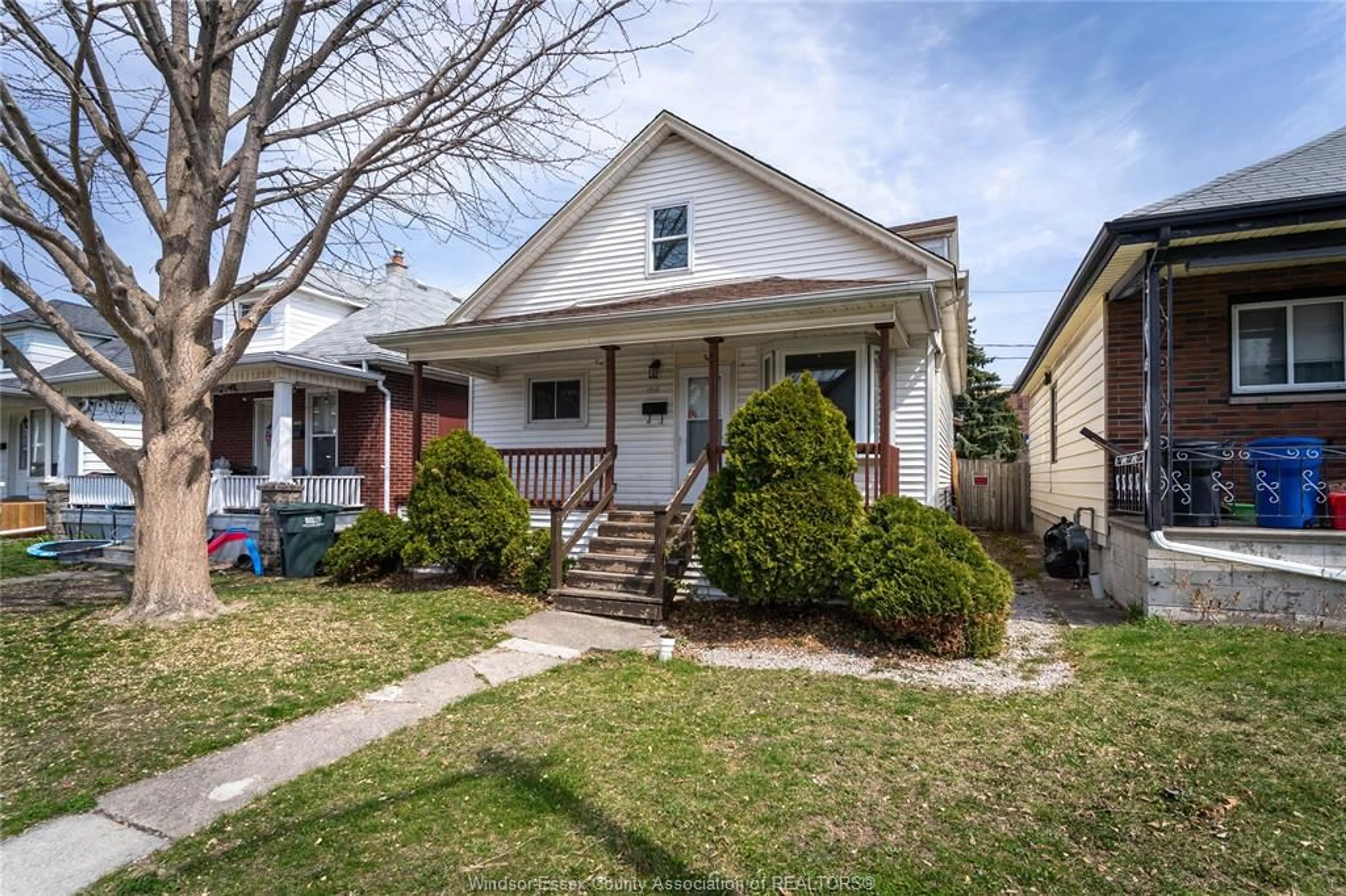 Home with vinyl exterior material, street for 1718 HIGHLAND Ave, Windsor Ontario N8X 3S1