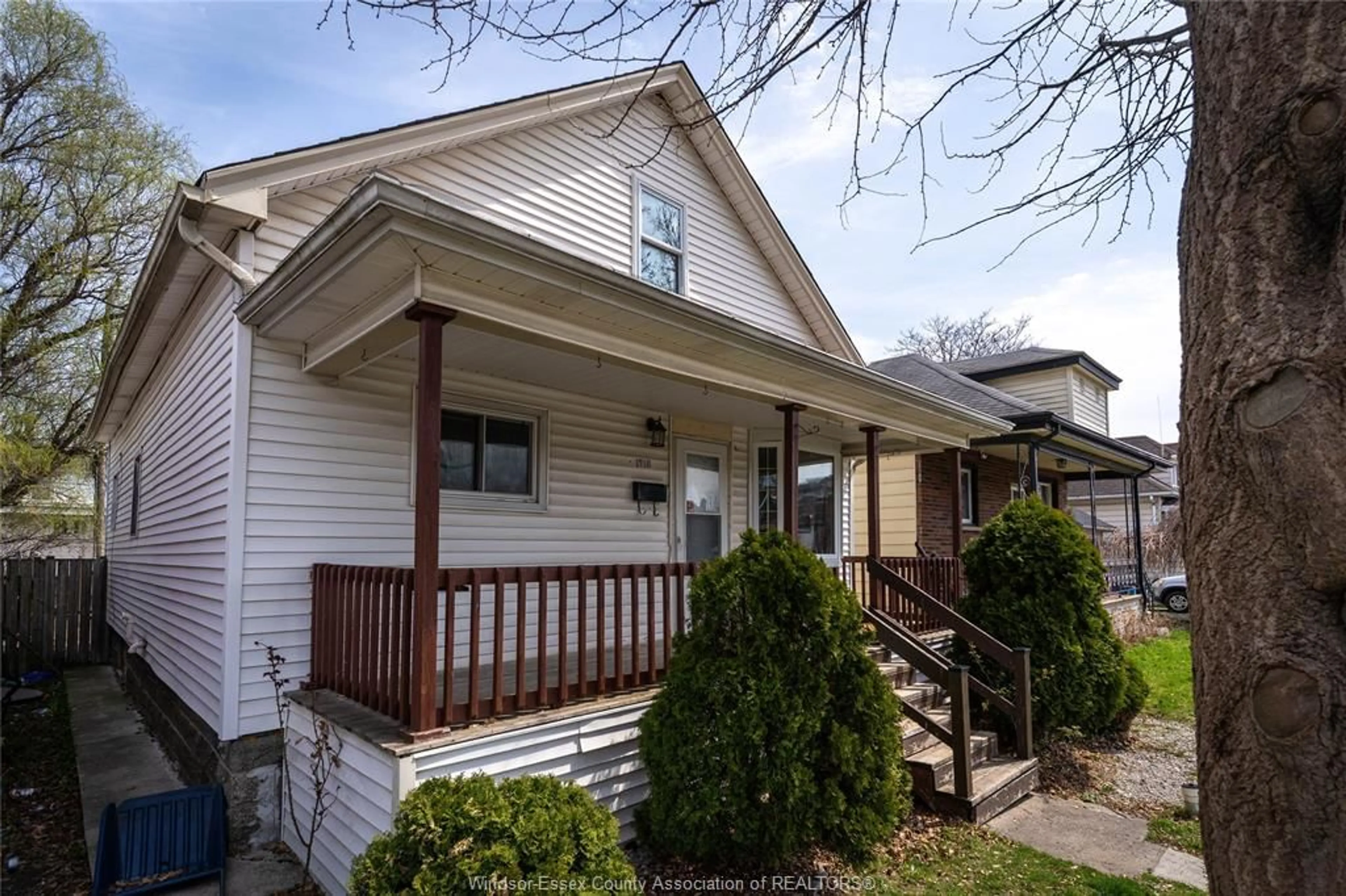 Home with vinyl exterior material, street for 1718 HIGHLAND Ave, Windsor Ontario N8X 3S1