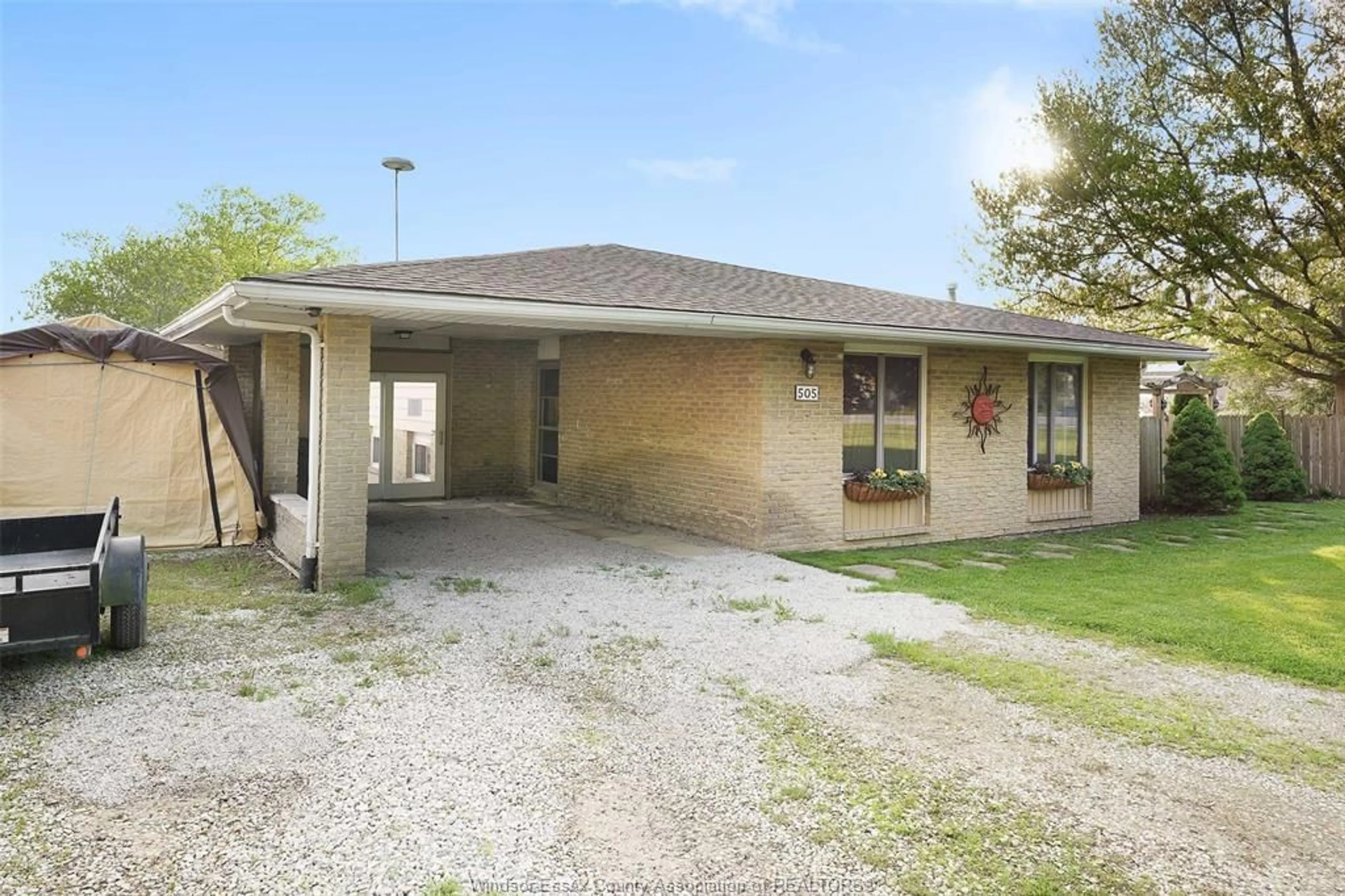 A pic from outside/outdoor area/front of a property/back of a property/a pic from drone, street for 505 COUNTY RD 34, Kingsville Ontario N8M 2X5