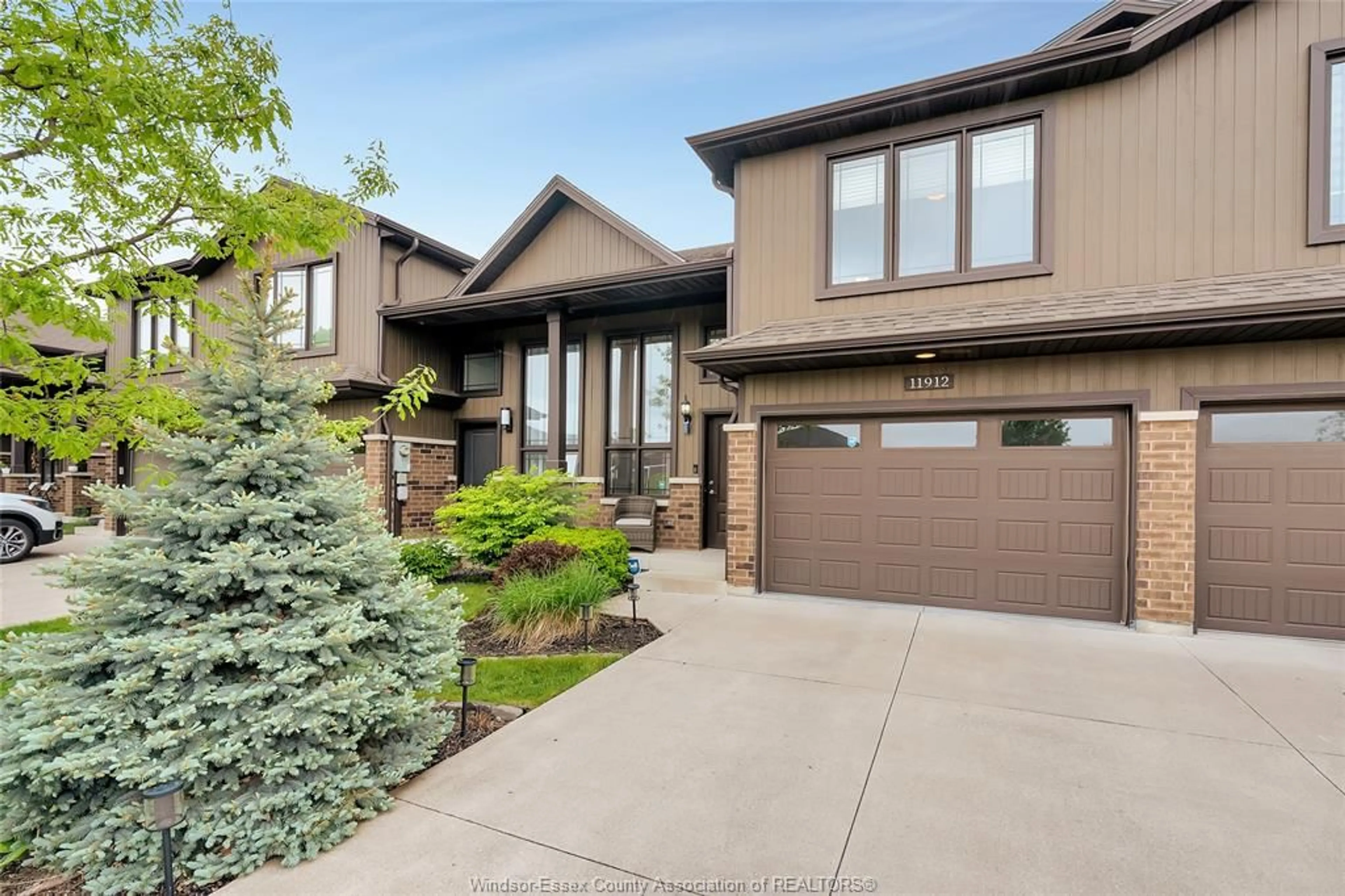 Home with brick exterior material, street for 11912 THISTLEDOWN Ave, Windsor Ontario N8P 0A1
