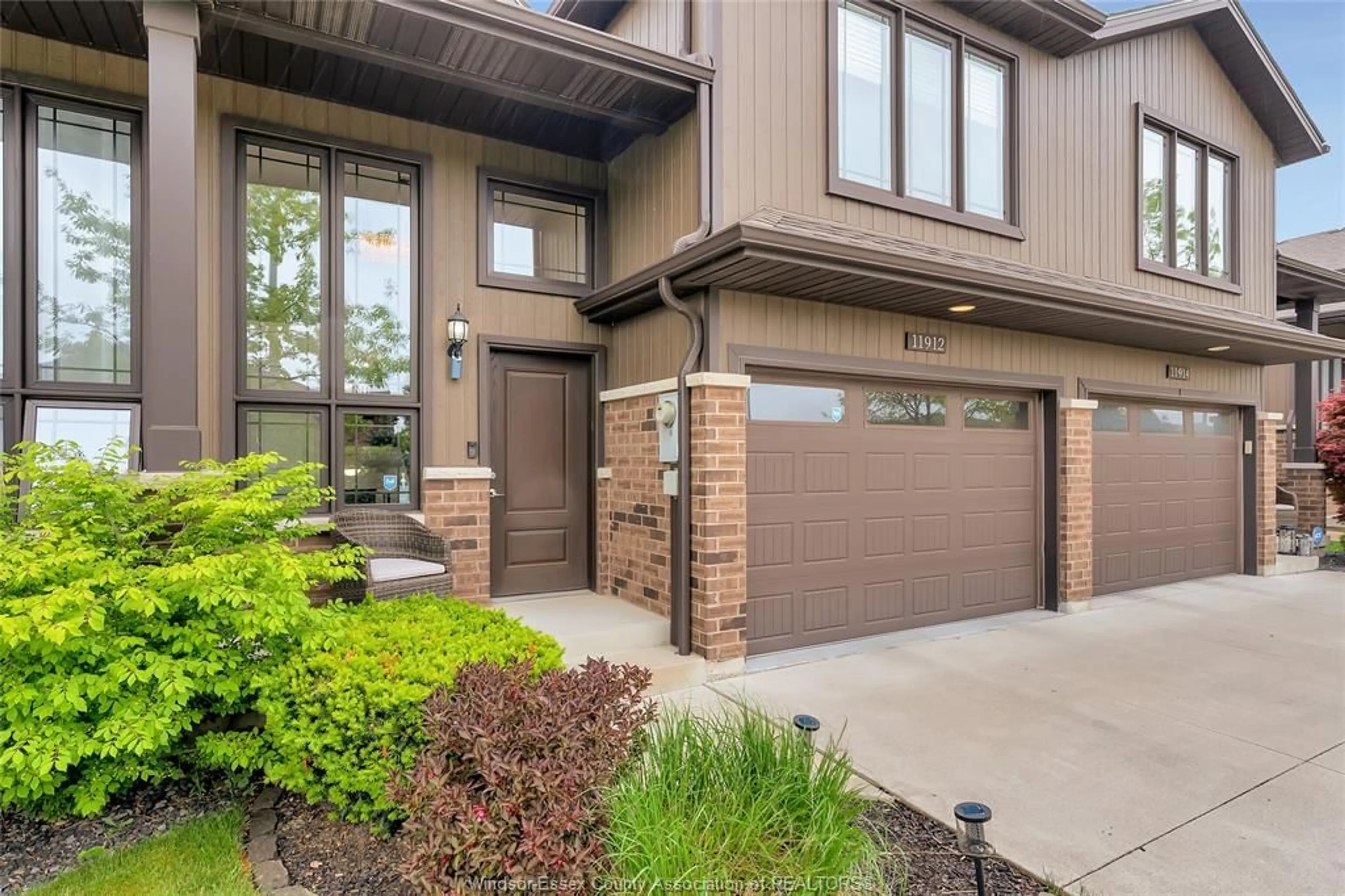 Home with brick exterior material, street for 11912 THISTLEDOWN Ave, Windsor Ontario N8P 0A1