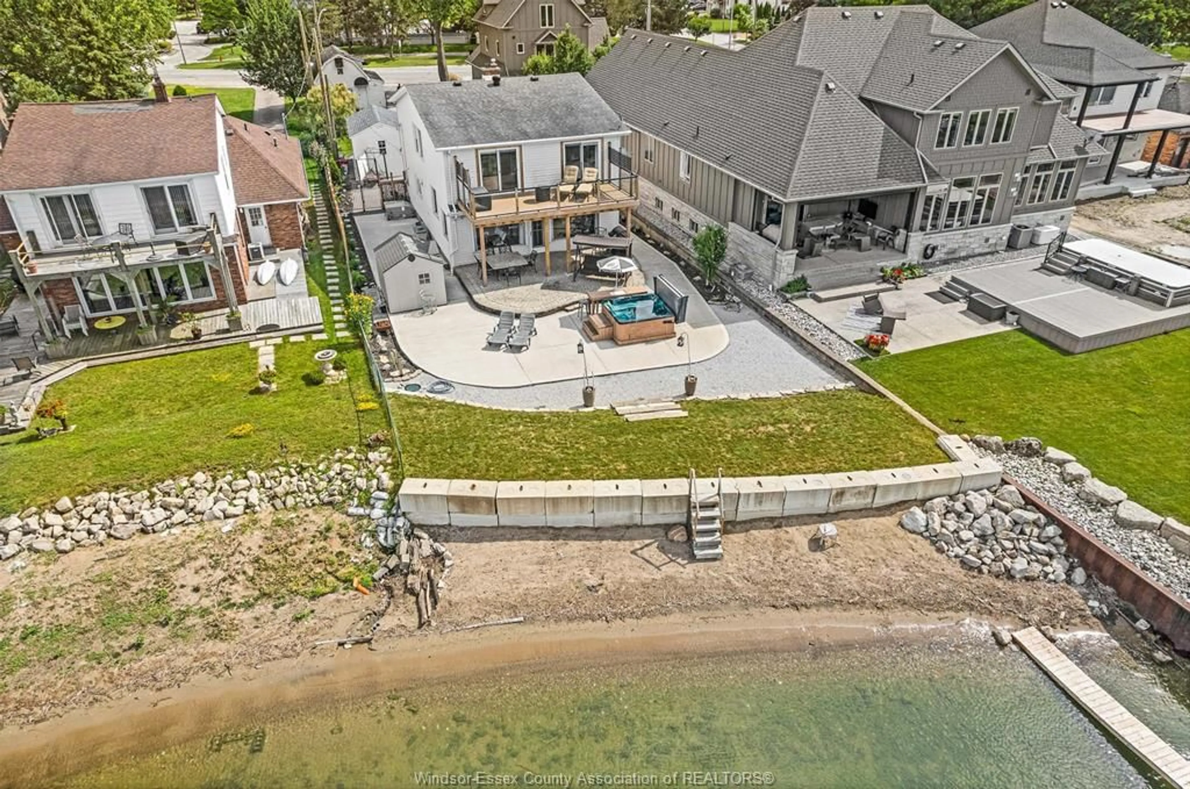 A pic from outside/outdoor area/front of a property/back of a property/a pic from drone, water/lake/river/ocean view for 12086 RIVERSIDE Dr, Tecumseh Ontario N8P 1A9