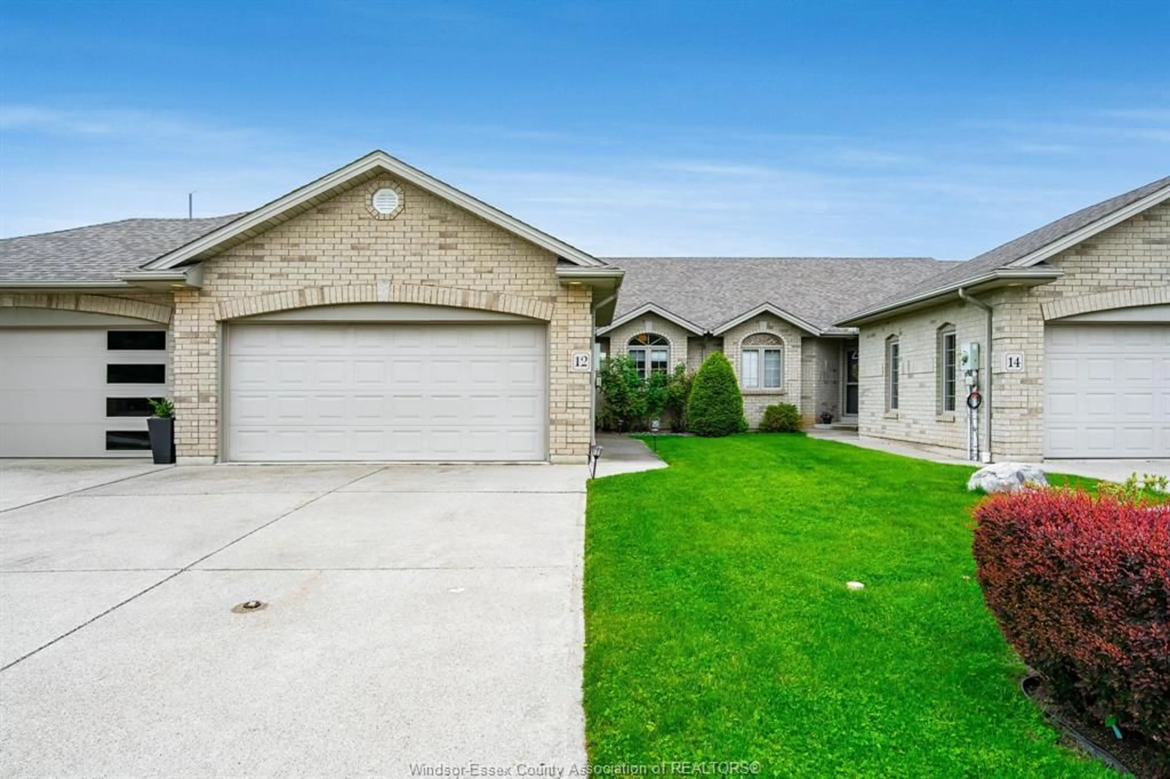 Home with brick exterior material, street for 12 LEONARD Dr, Kingsville Ontario N9Y 4G4