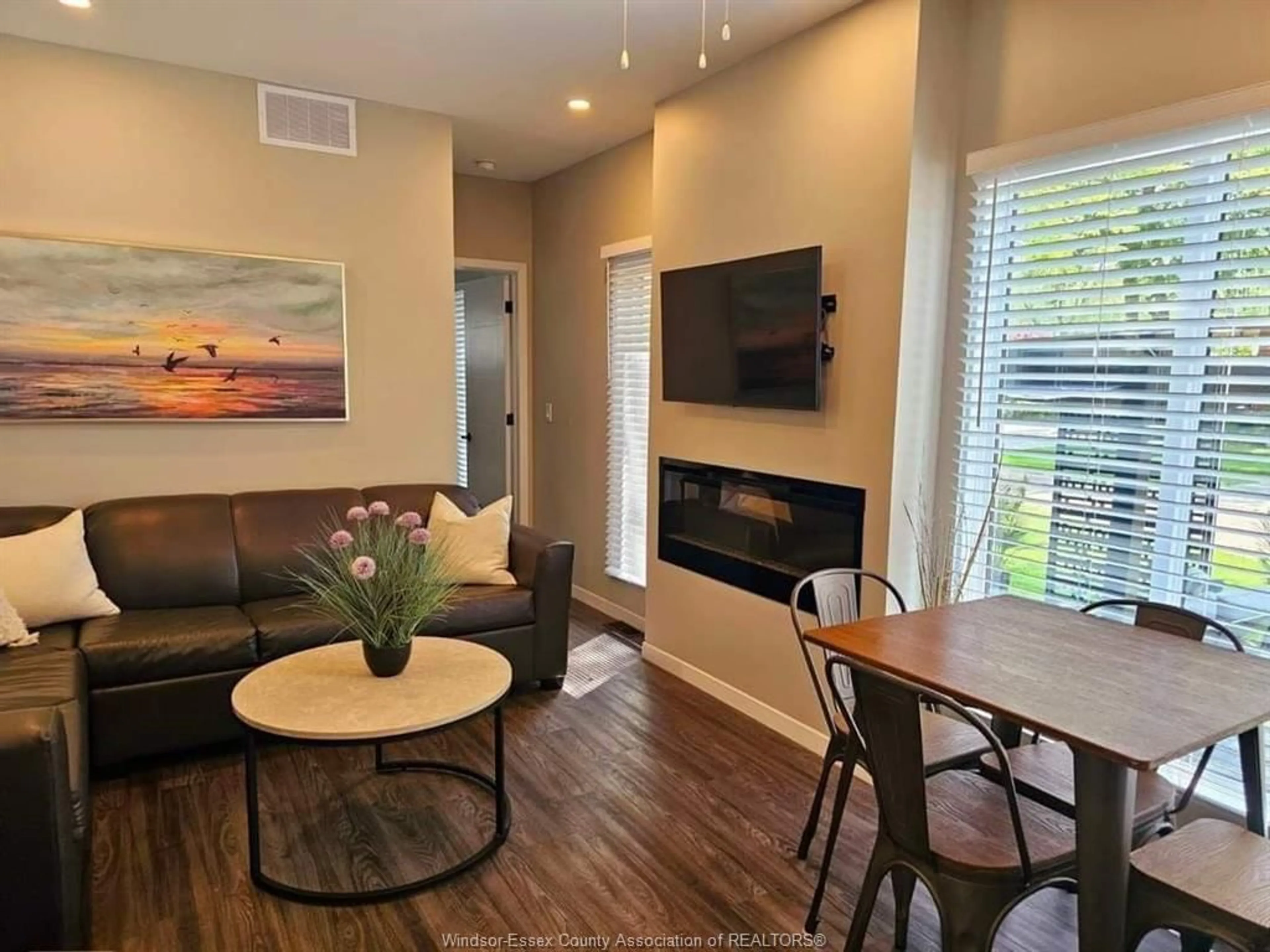 Living room with furniture, wood/laminate floor for 981 COUNTY RD 2 #532, Lakeshore Ontario N0R 1A0