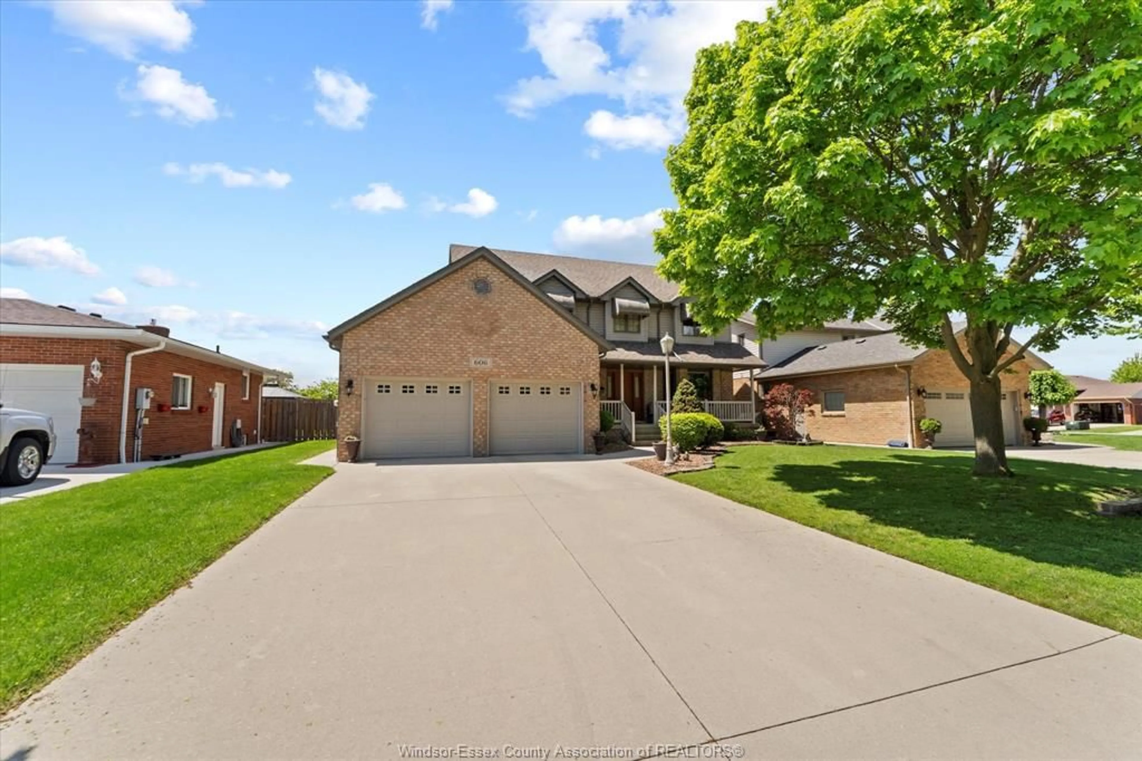 Home with brick exterior material, street for 606 PINE RIDGE Ave, Amherstburg Ontario N9V 3W3