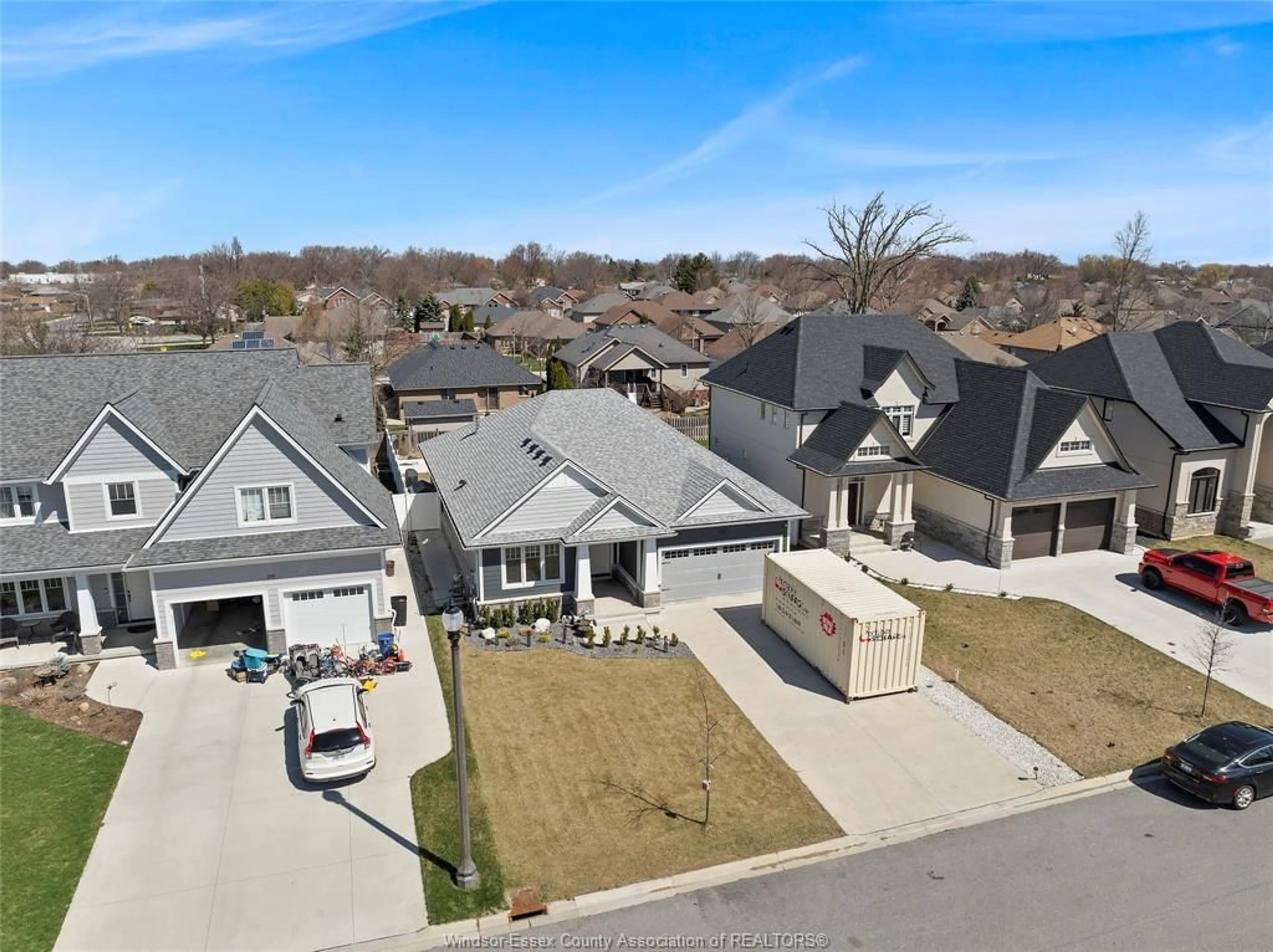 A pic from outside/outdoor area/front of a property/back of a property/a pic from drone, street for 297 CHRISTINE, Belle River Ontario N0R 1A0