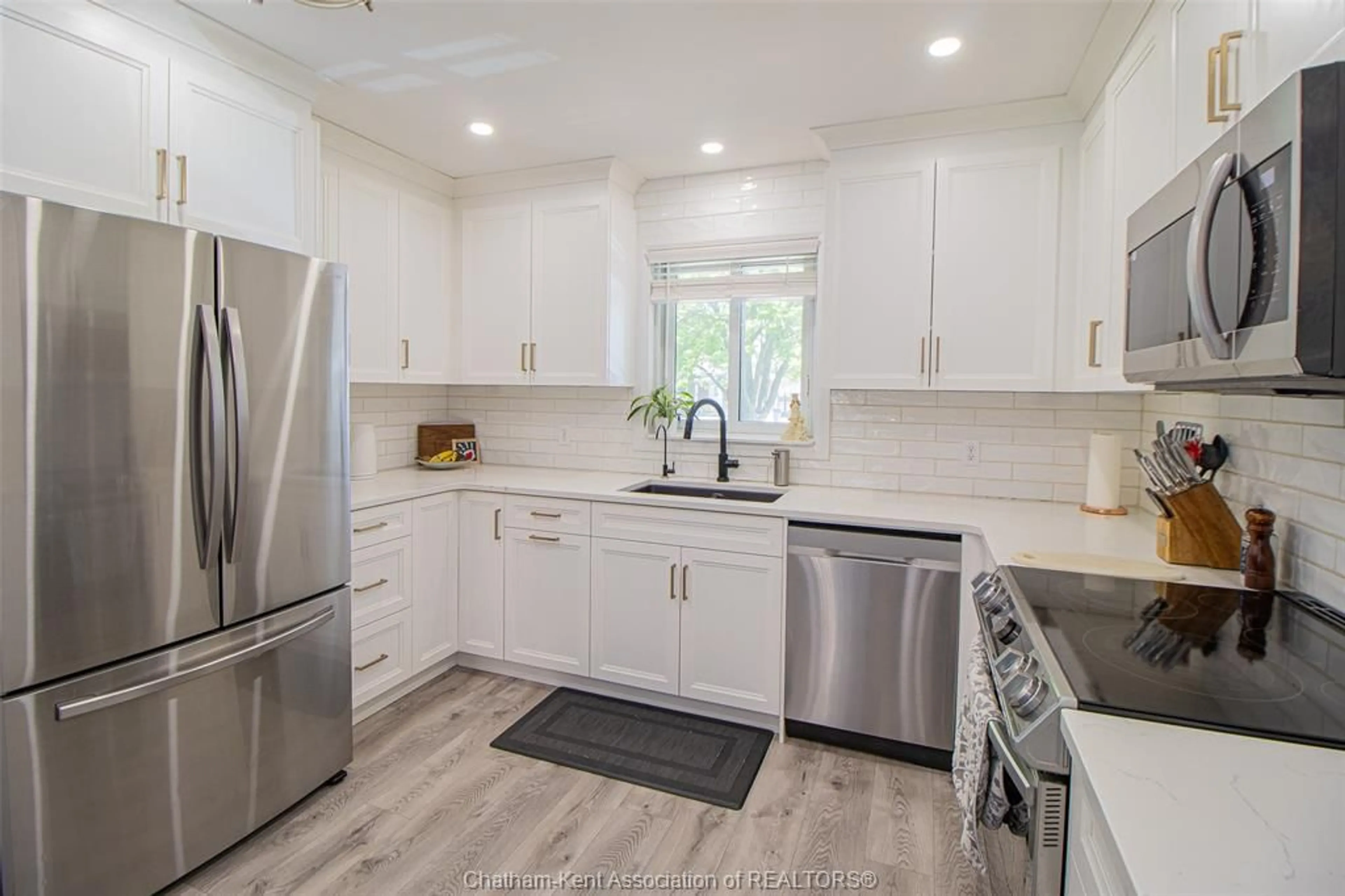 Open concept kitchen, ceramic/tile floor for 73 Oriole Pky #1, Chatham Ontario N7M 5J5