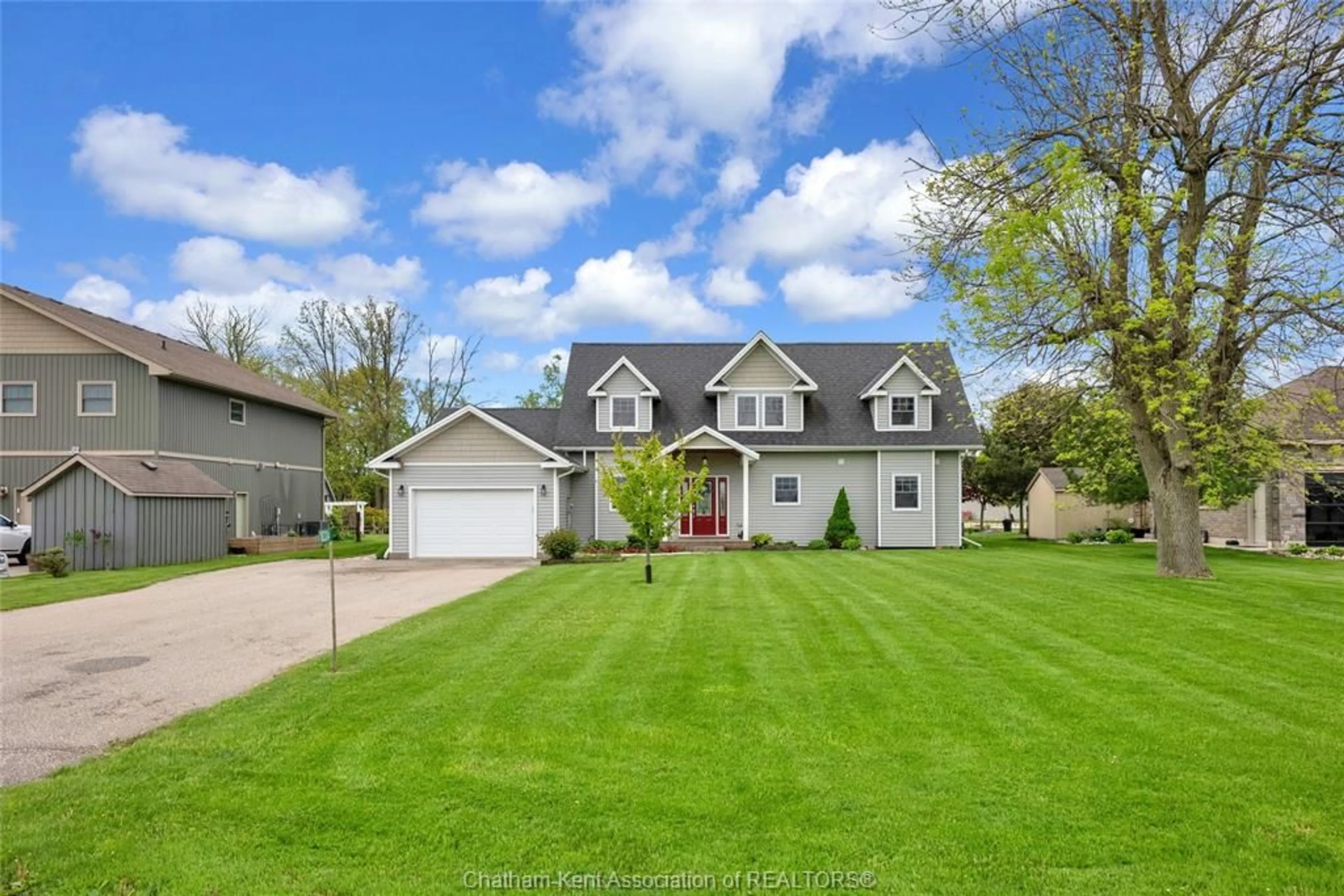 Home with vinyl exterior material, street for 18334 MARINE PARK Dr, Morpeth Ontario N0P 1X0