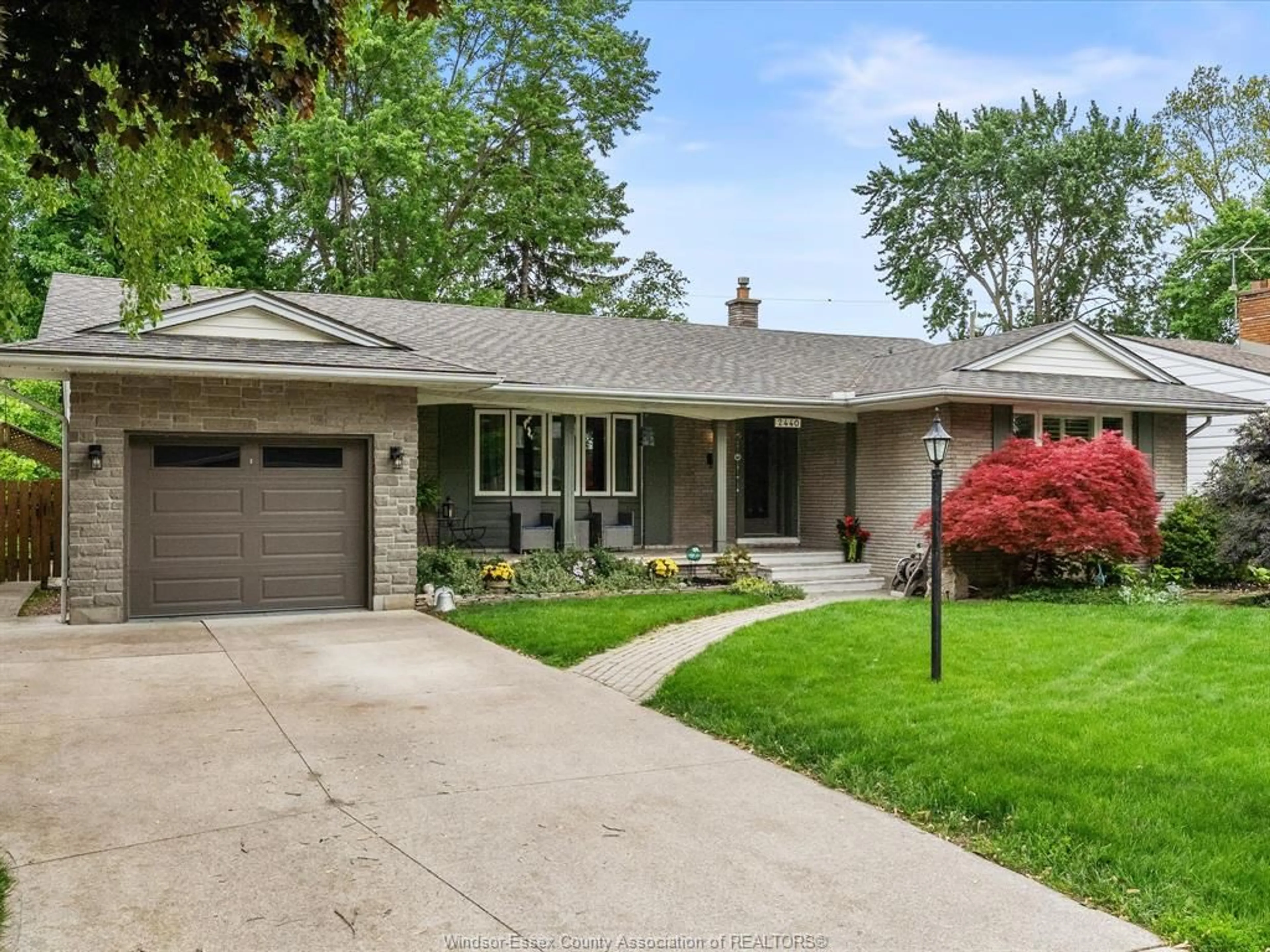 Home with brick exterior material, street for 2440 Academy, Windsor Ontario N9E 2G6