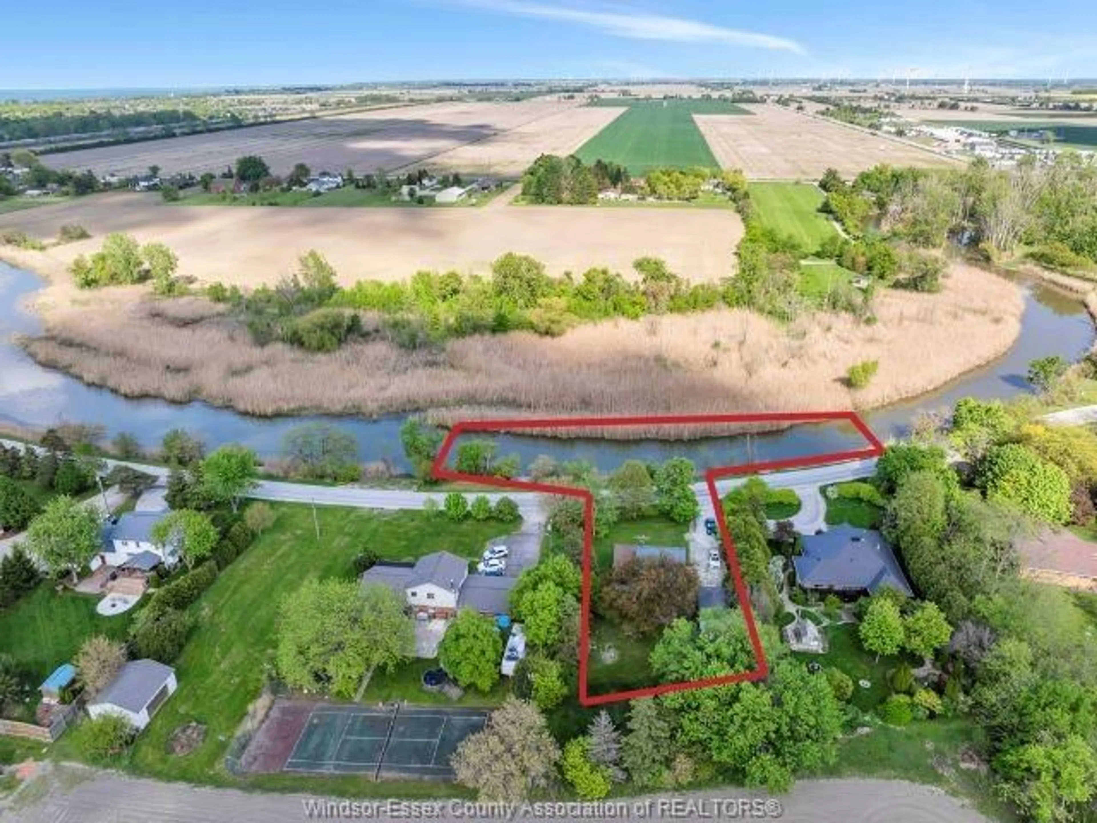 A pic from outside/outdoor area/front of a property/back of a property/a pic from drone, water/lake/river/ocean view for 607 WEST BELLE RIVER Rd, Lakeshore Ontario N0R 1A0