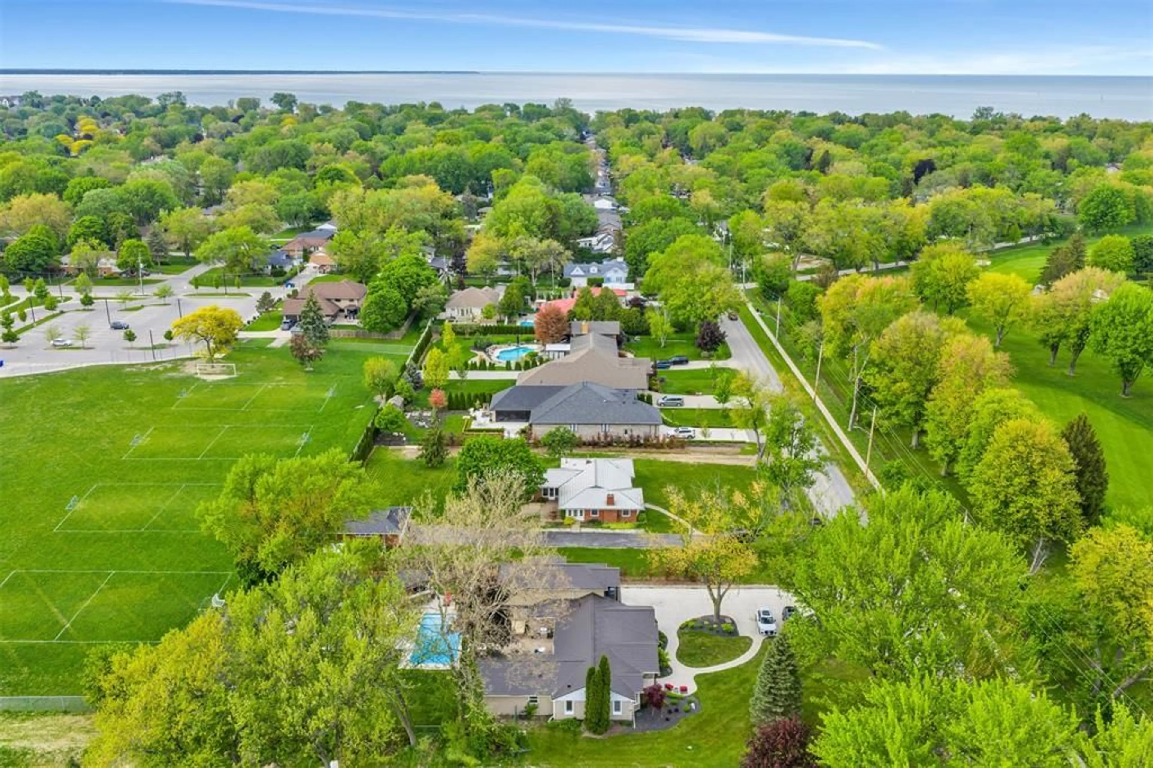 A pic from outside/outdoor area/front of a property/back of a property/a pic from drone, street for 451 ARLINGTON Blvd, Tecumseh Ontario N8N 2K1