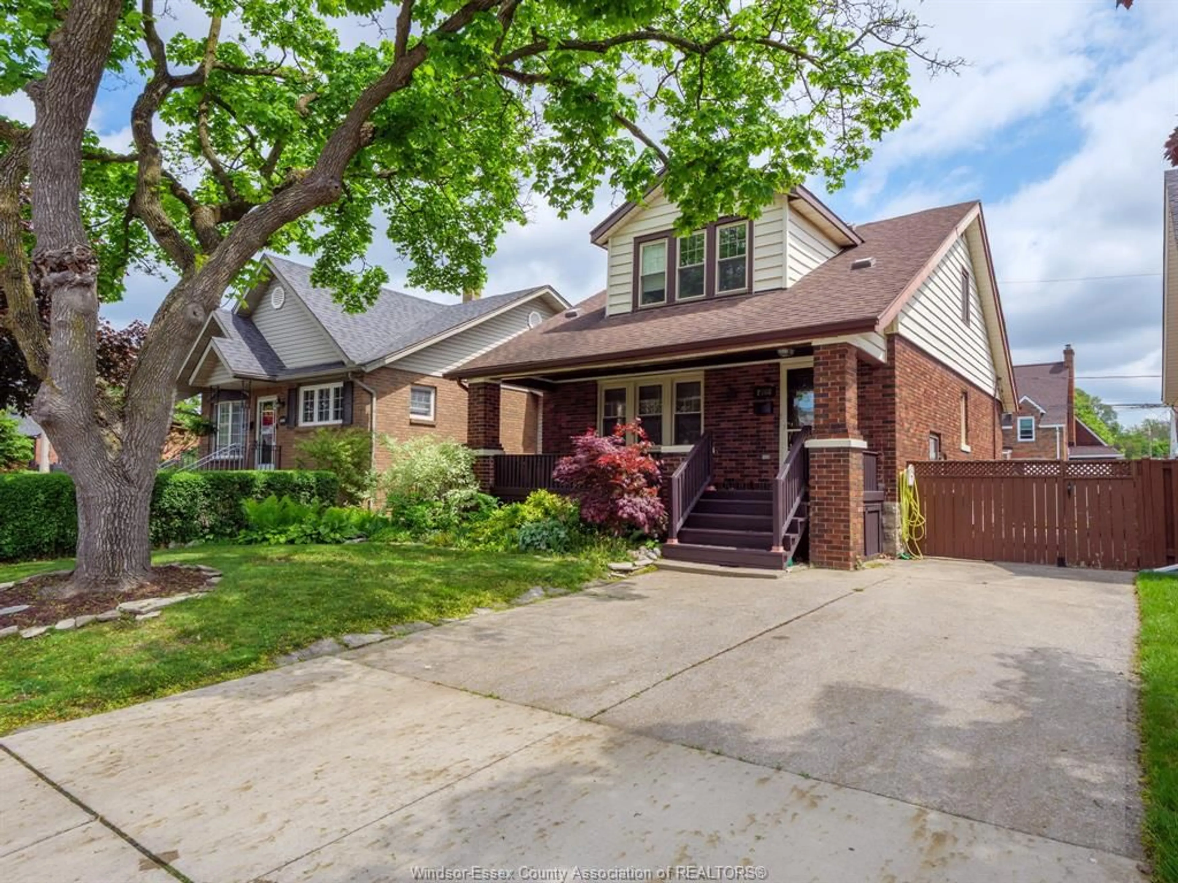 Home with brick exterior material, street for 2308 WINDERMERE Rd, Windsor Ontario N8W 2S9