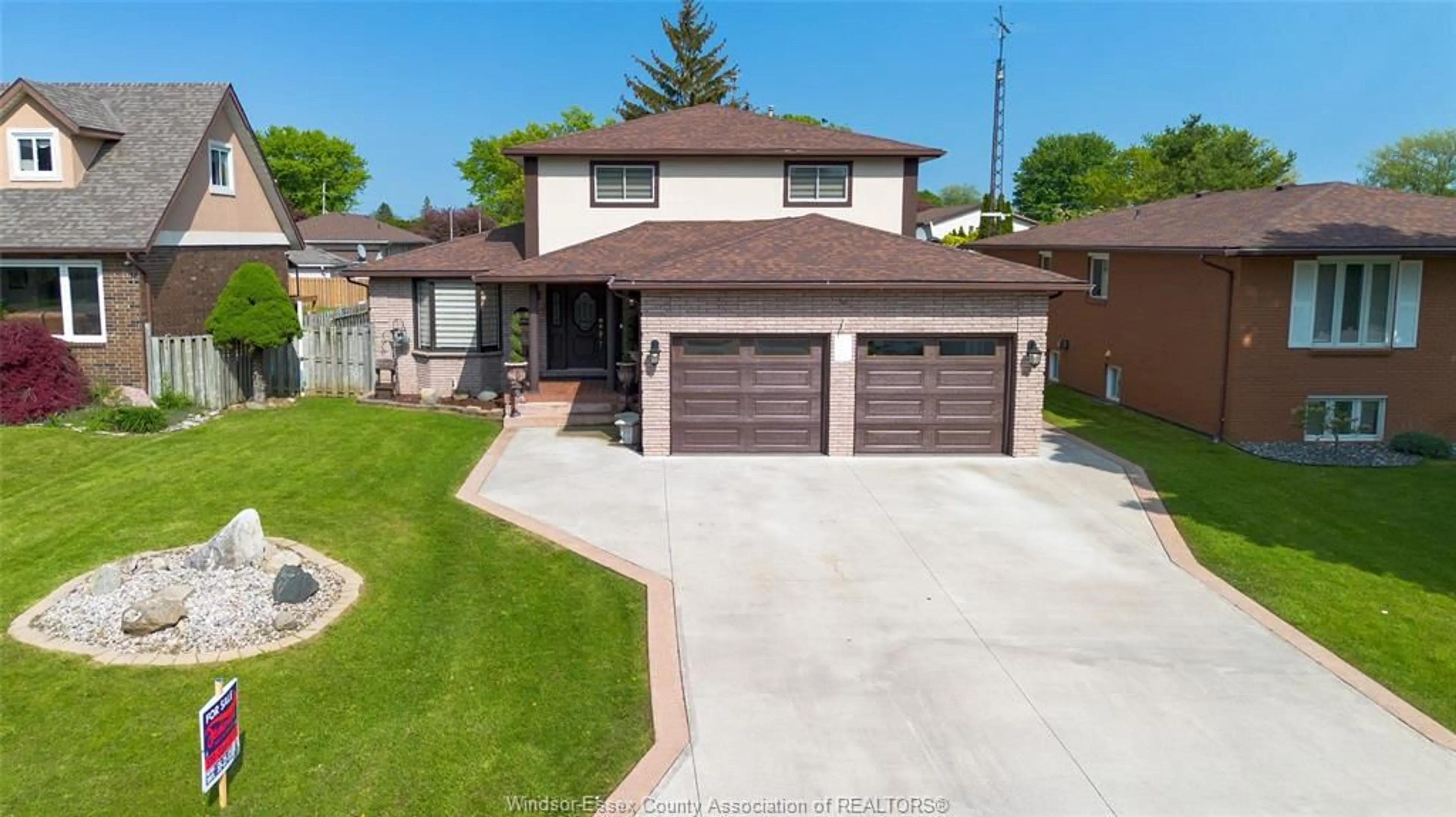 Home with brick exterior material, street for 16 WINDWOOD Dr, Leamington Ontario N8H 4Y2
