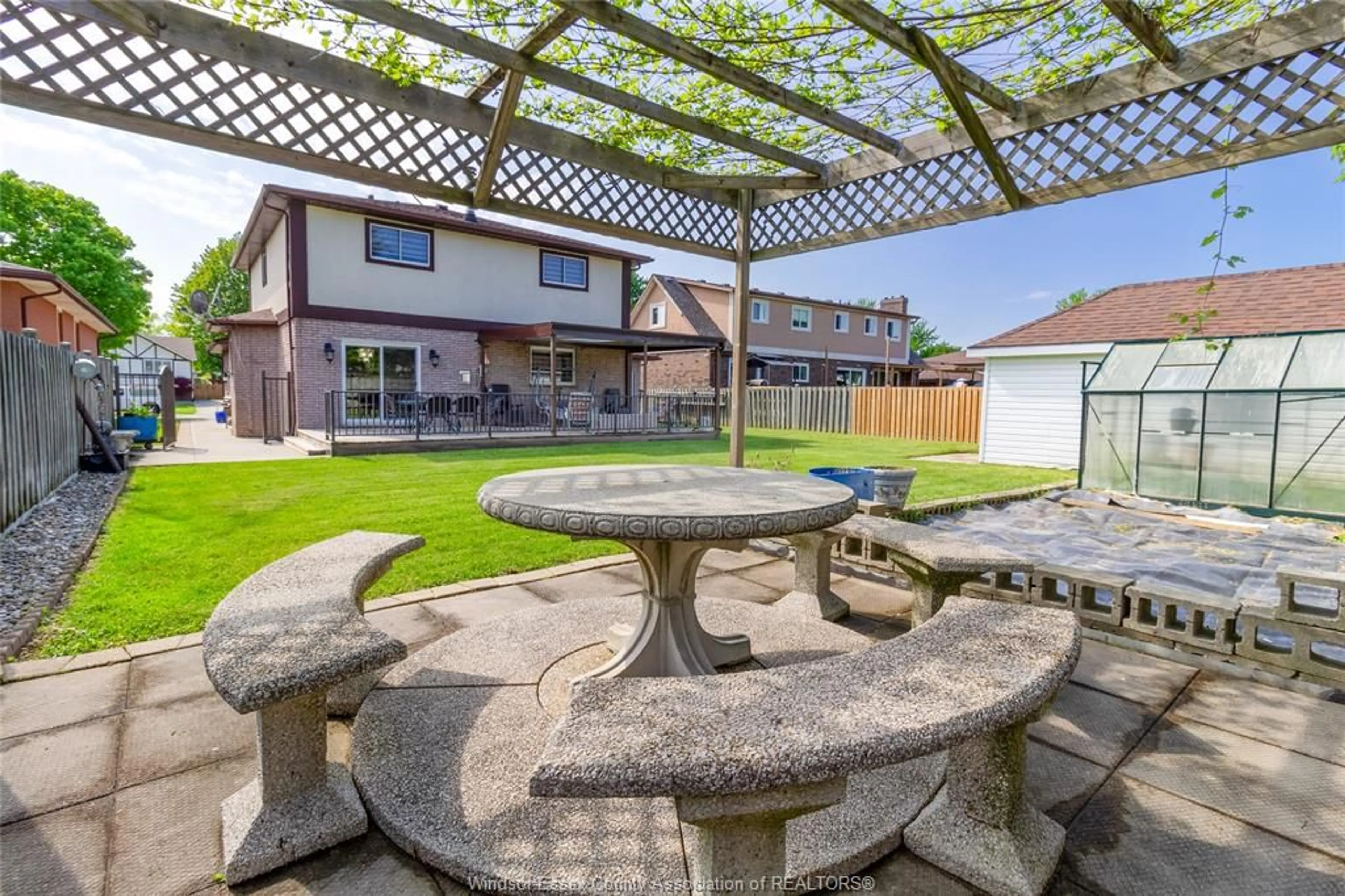 Patio, street for 16 WINDWOOD Dr, Leamington Ontario N8H 4Y2