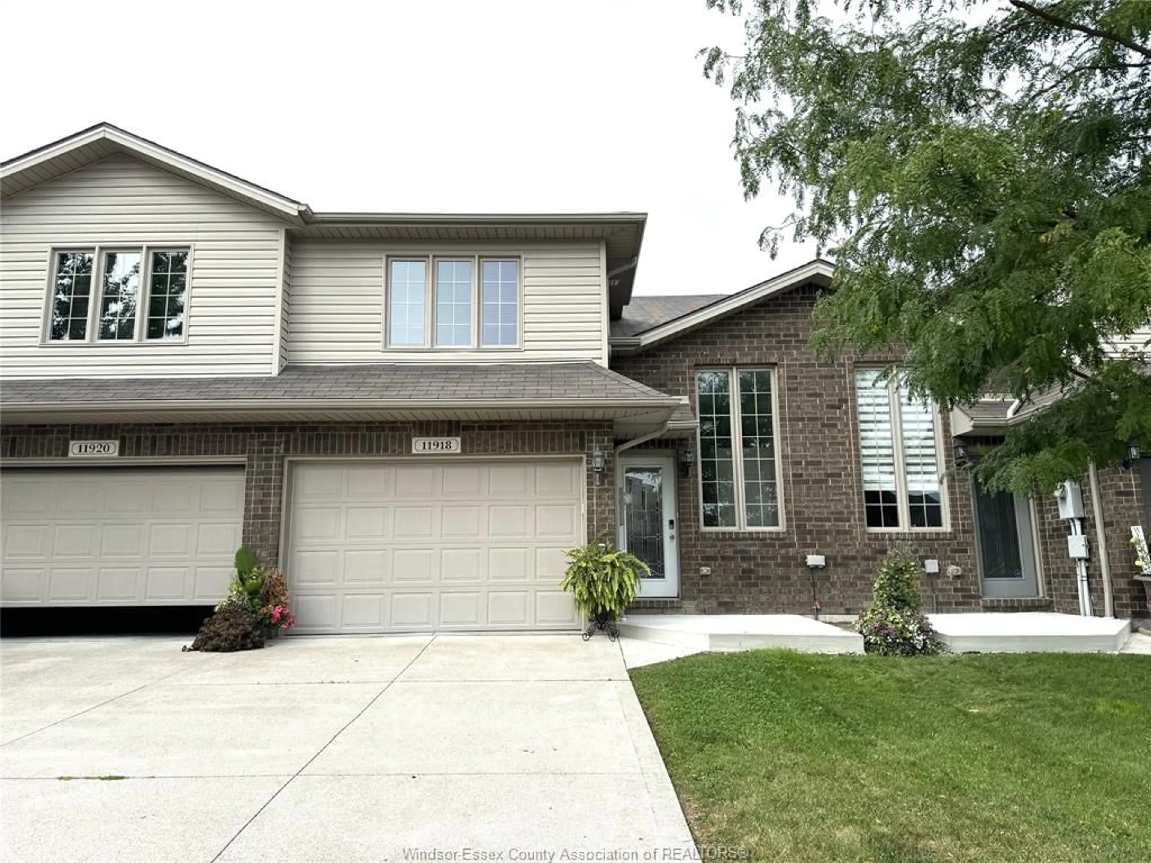 Home with brick exterior material, street for 11918 BOULDER Cres, Windsor Ontario N8P 1Z6