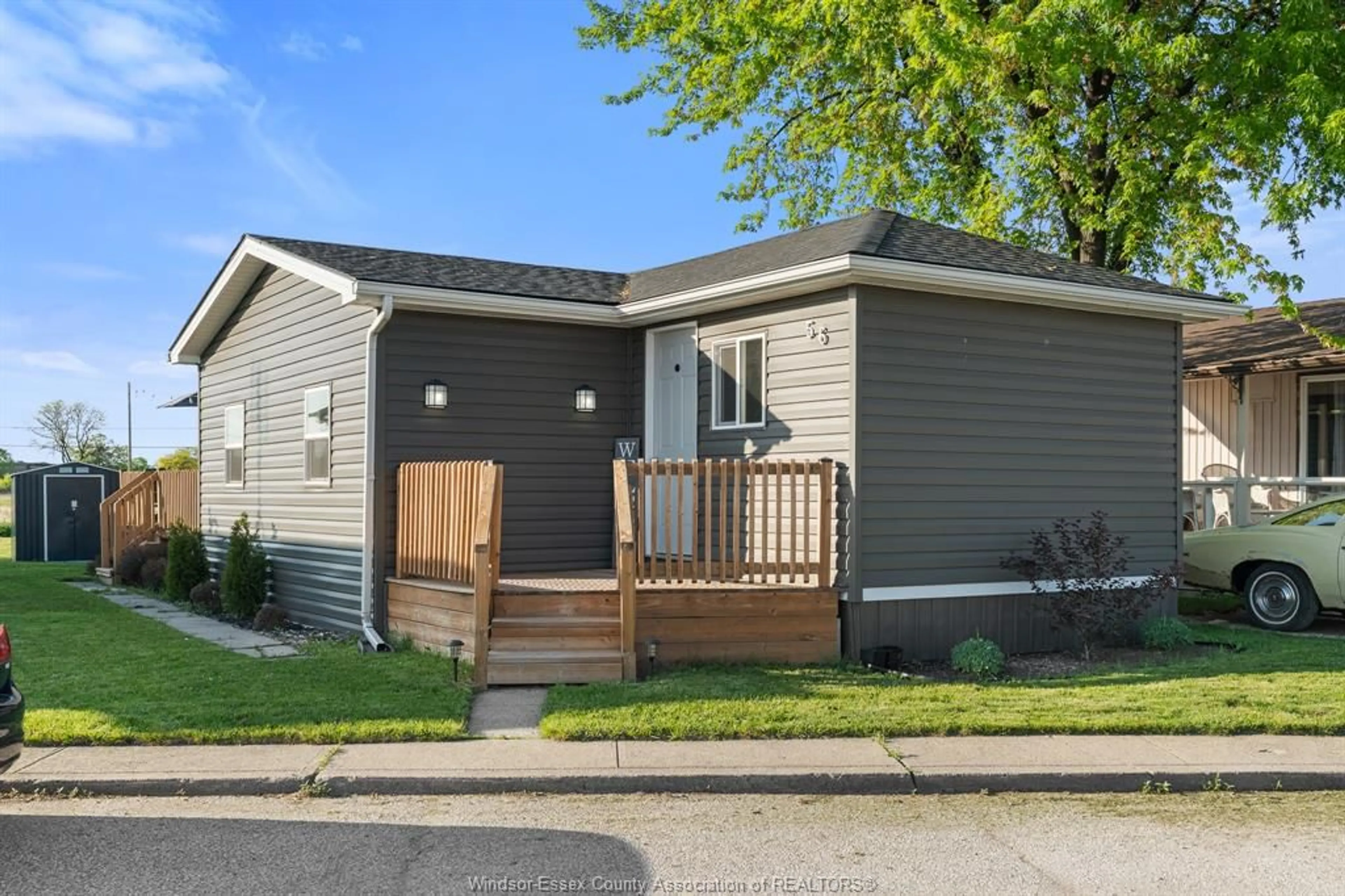 Home with vinyl exterior material, street for 56 WILDER Dr, Lakeshore Ontario N8N 2S3