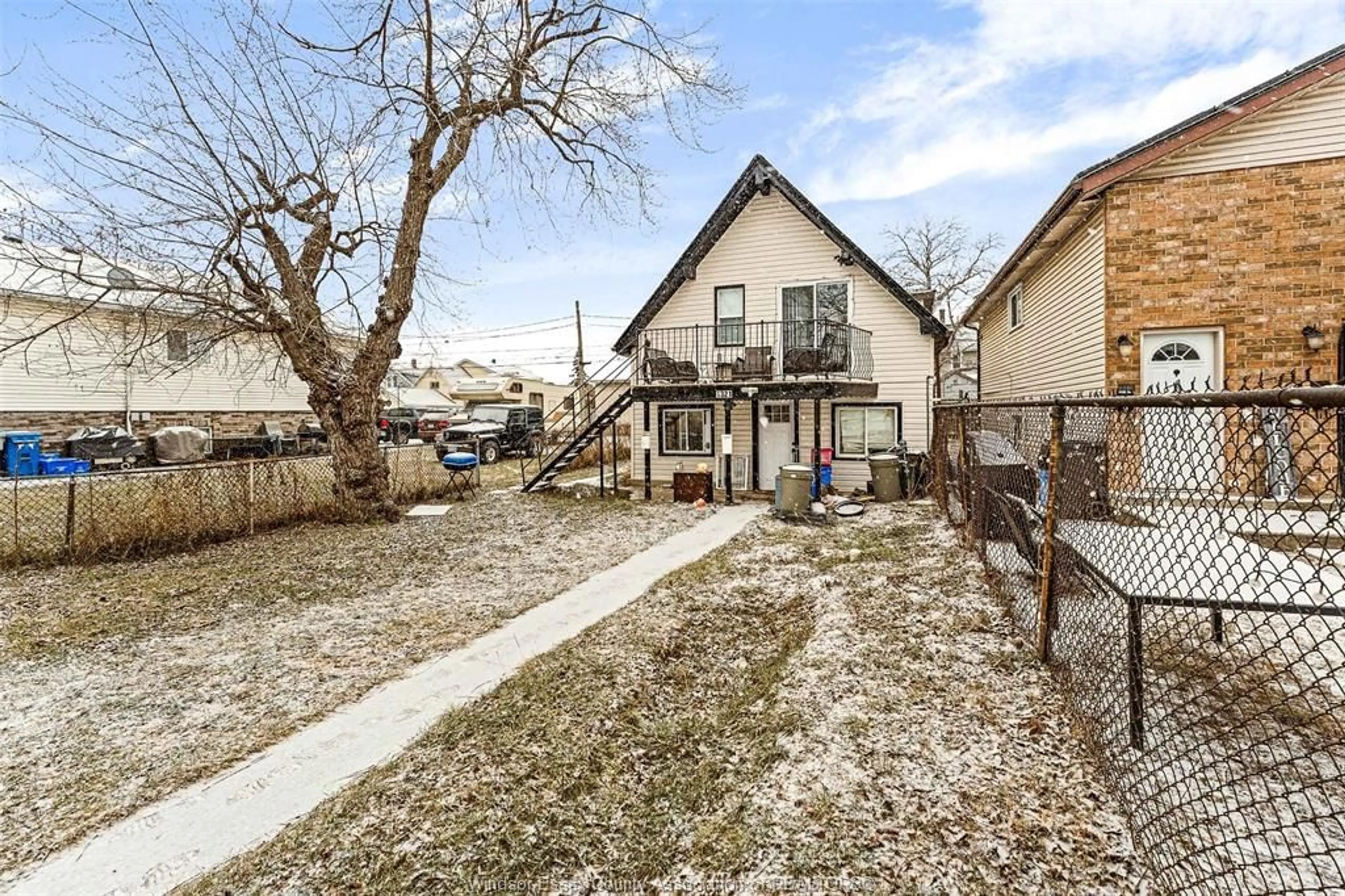 A pic from outside/outdoor area/front of a property/back of a property/a pic from drone, street for 1321 Henry Ford, Windsor Ontario N8Y 2T9