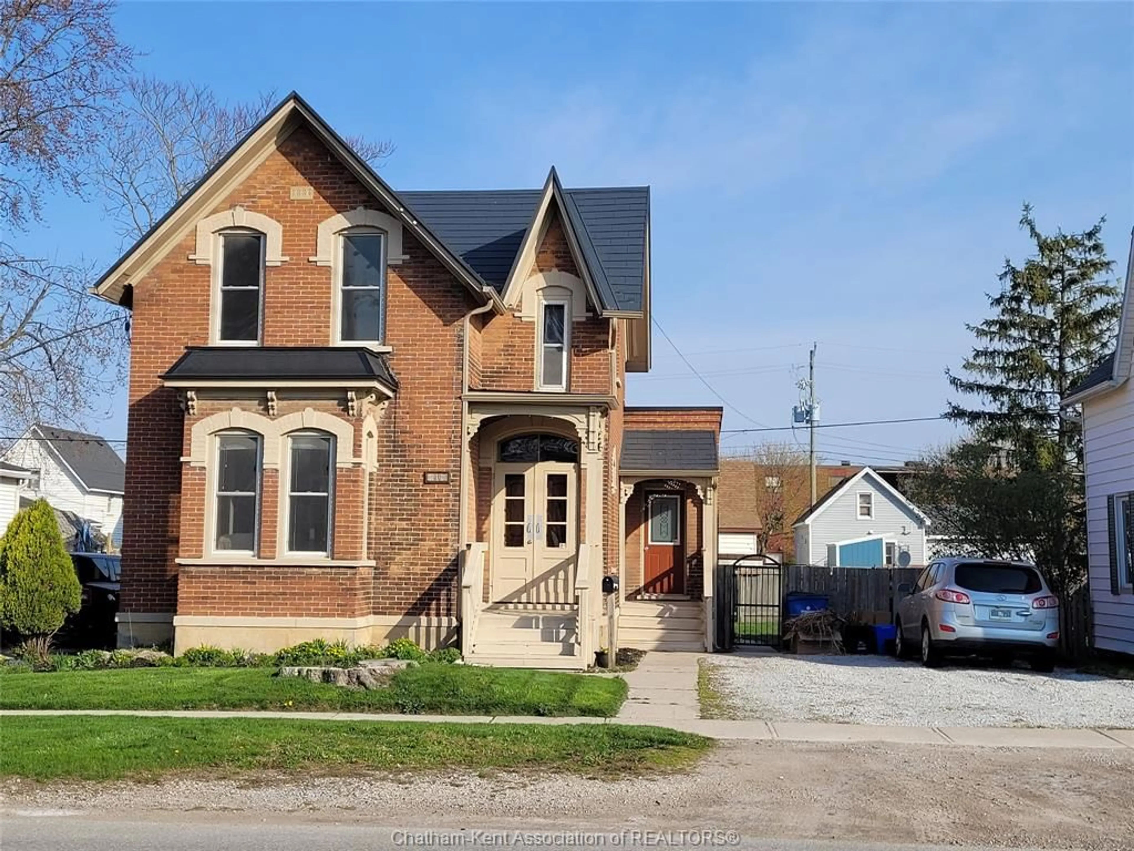Home with brick exterior material, street for 20 Gillard St, Wallaceburg Ontario N8A 1M7