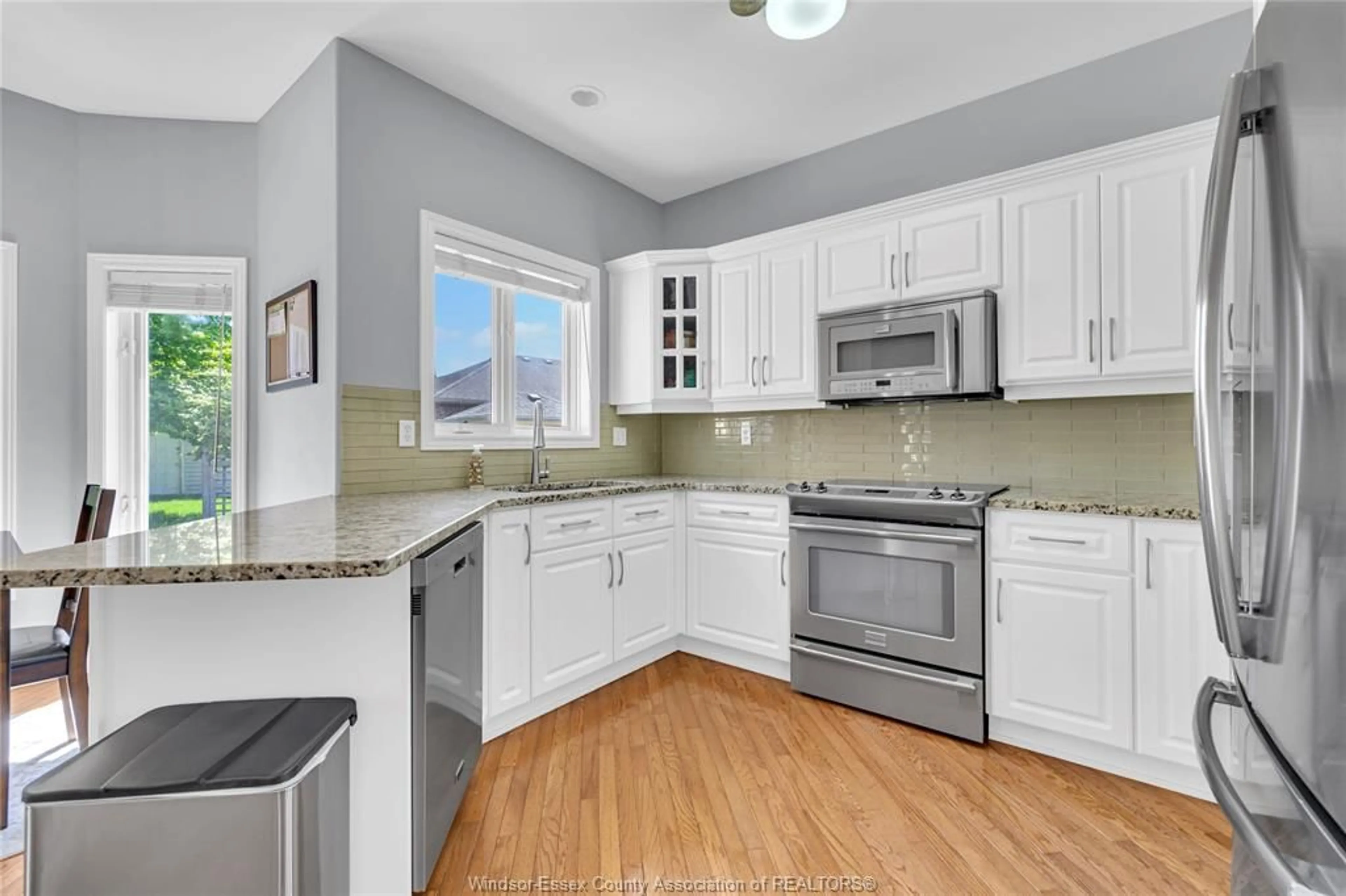 Open concept kitchen, ceramic/tile floor for 9568 Manitou Cres, Windsor Ontario N8P 1H8