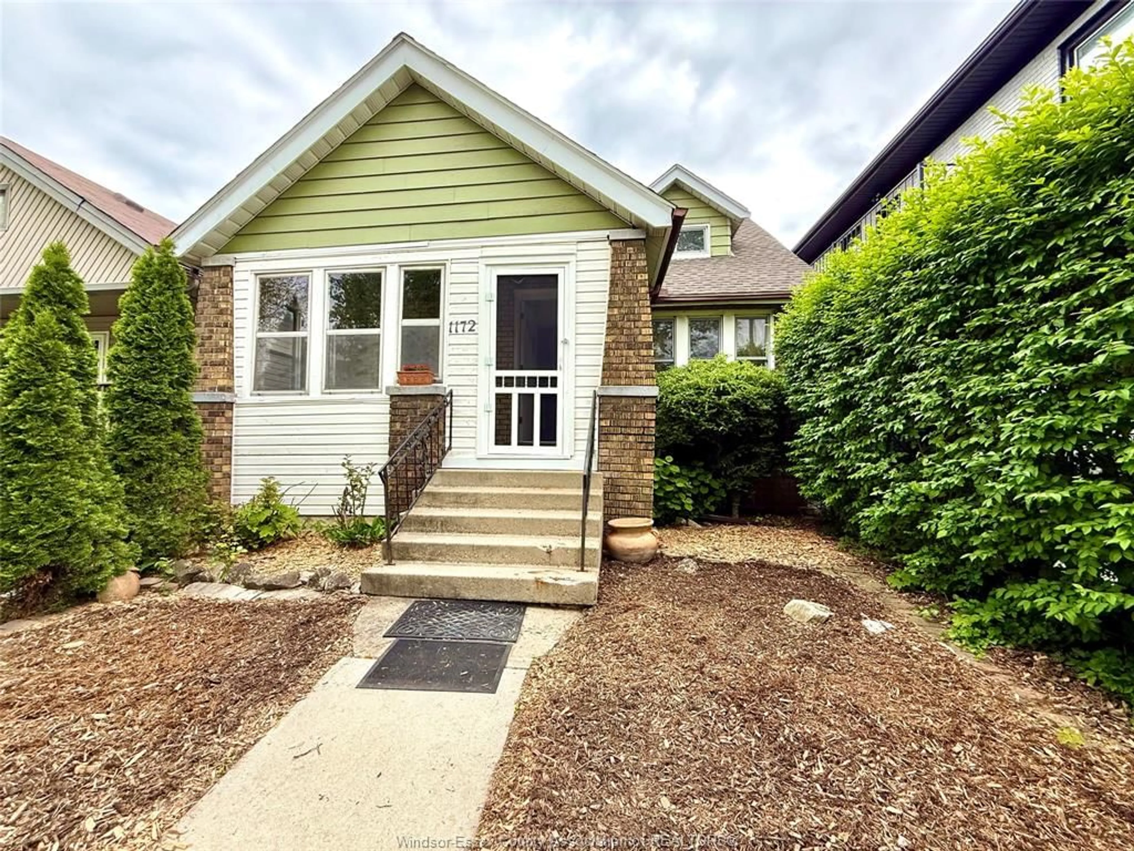 Home with brick exterior material, street for 1172 Gladstone, Windsor Ontario N9A 2S1