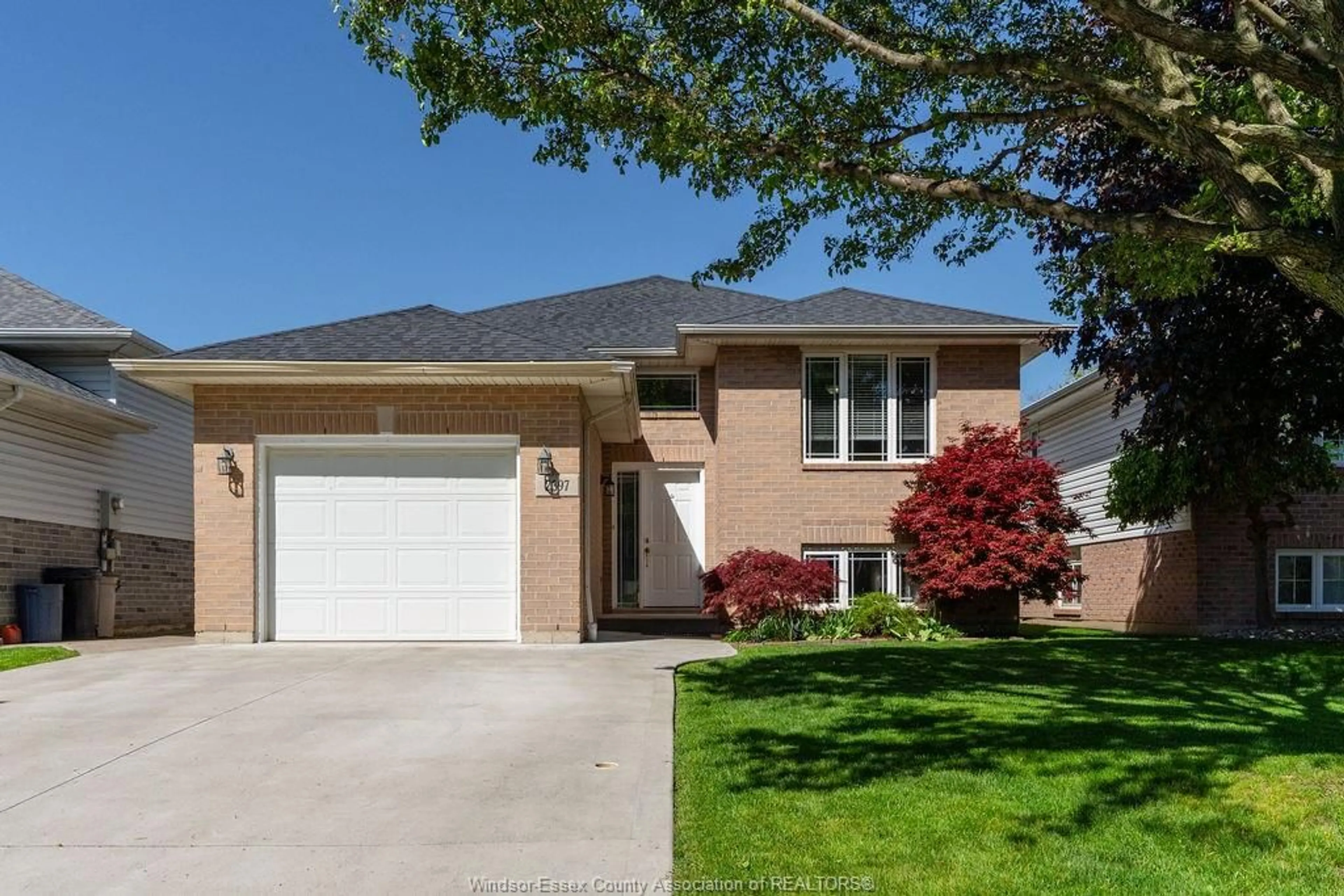 Home with vinyl exterior material, street for 2397 TRANQUILITY Ave, Windsor Ontario N8P 1R8