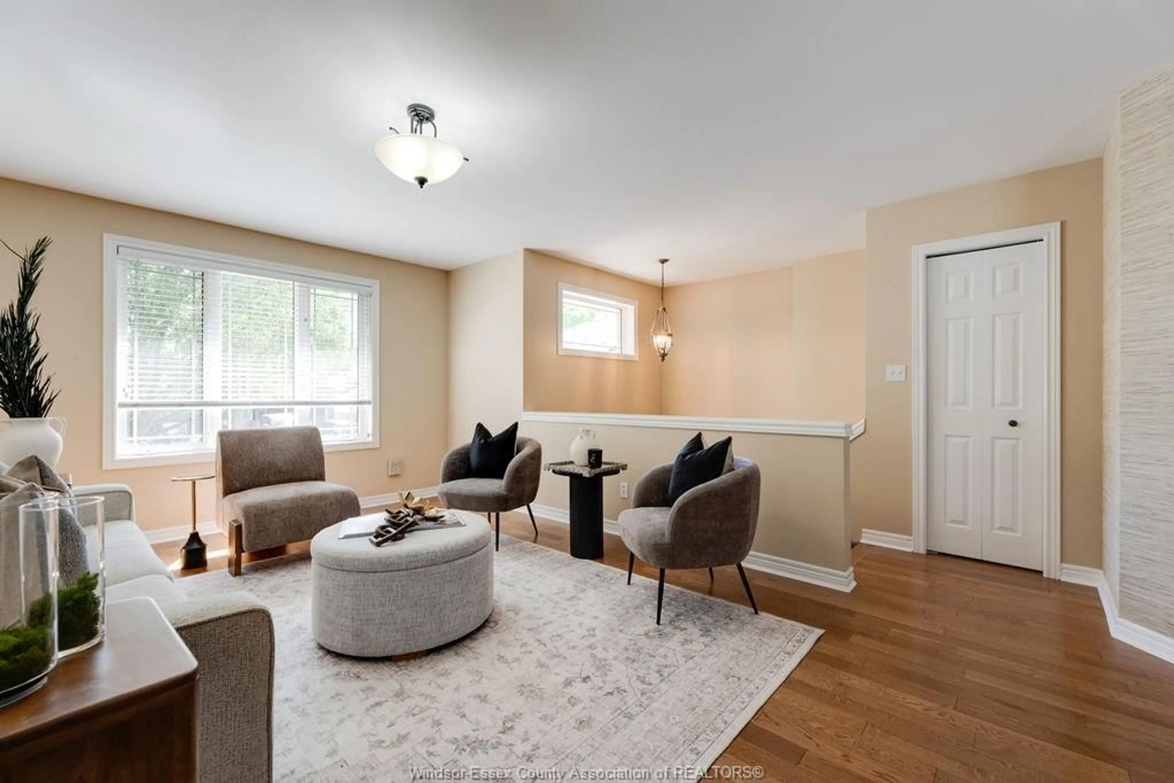 Living room with furniture, wood/laminate floor for 2397 TRANQUILITY Ave, Windsor Ontario N8P 1R8