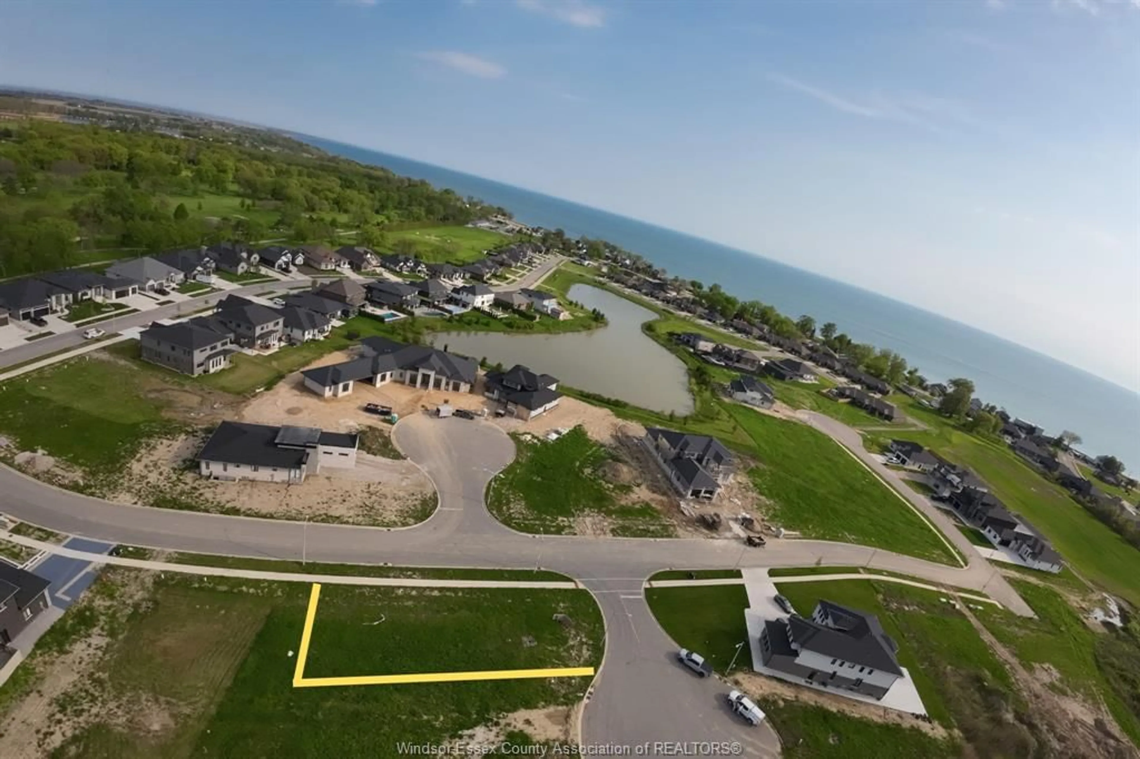 A pic from outside/outdoor area/front of a property/back of a property/a pic from drone, water/lake/river/ocean view for 2 PEBBLE BEACH Crt, Leamington Ontario N8H 0G1