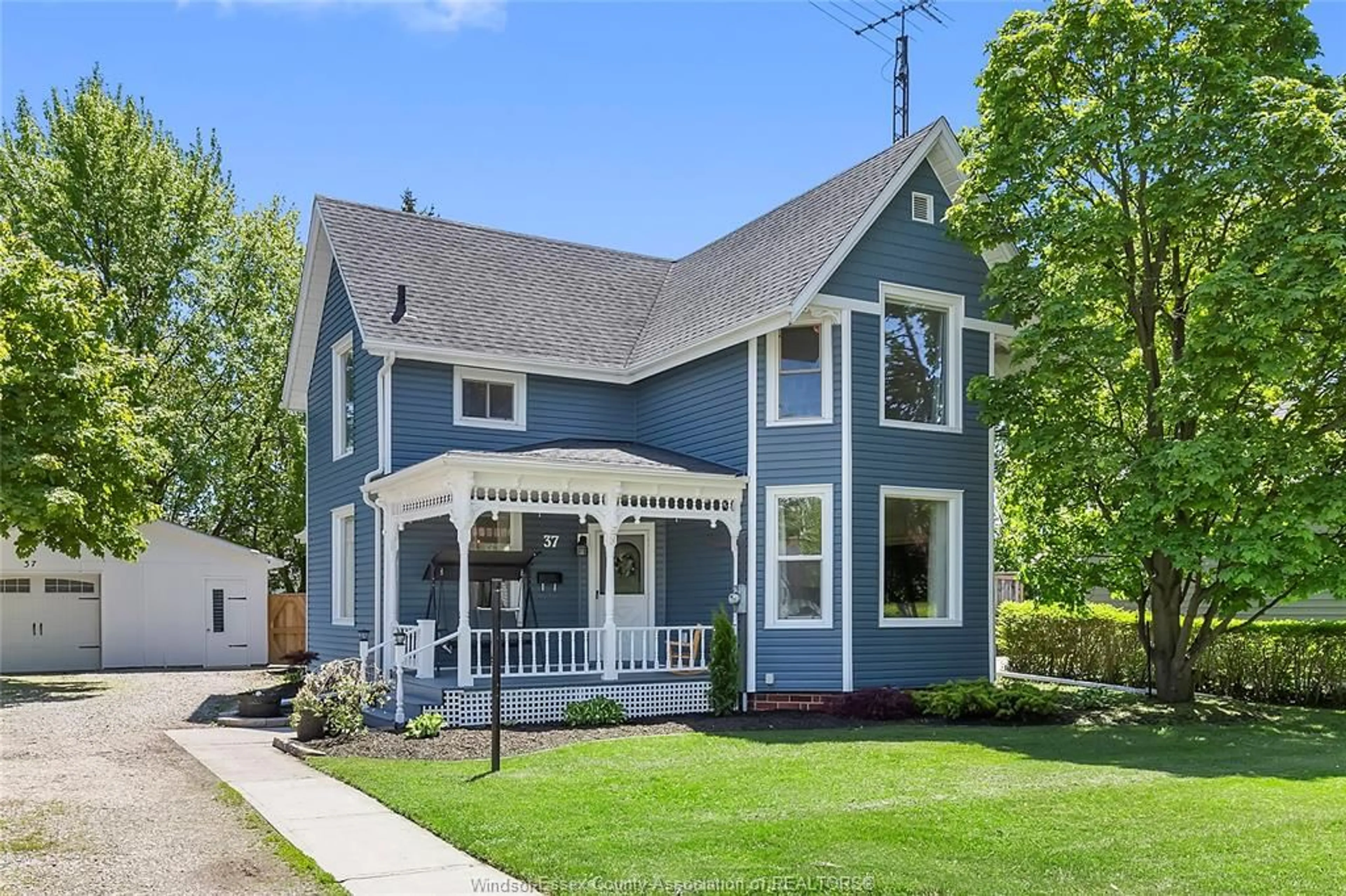 Home with vinyl exterior material, street for 37 Canal St, Tilbury Ontario N0P 2L0