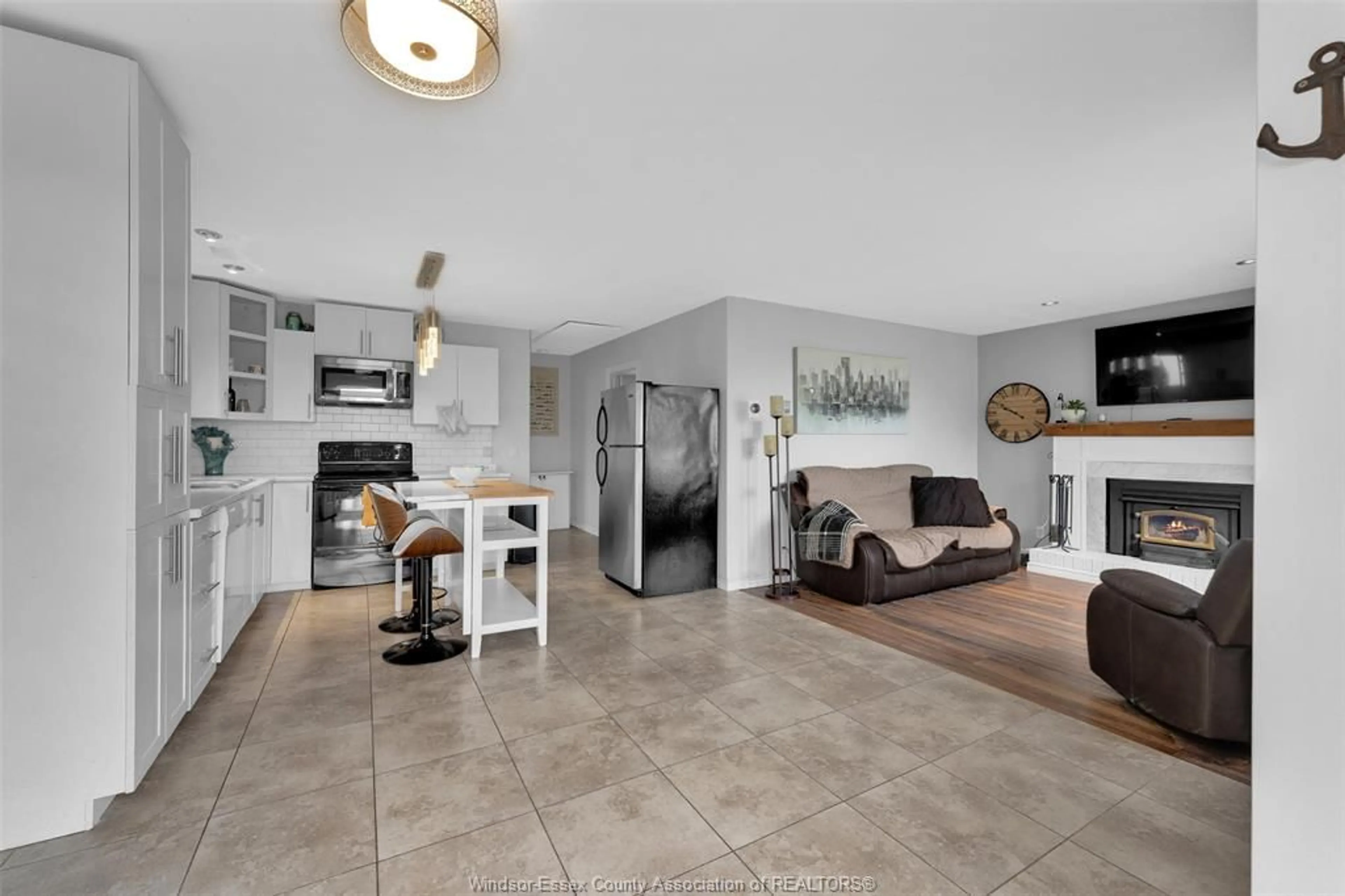 Living room with furniture, ceramic/tile floor for 2414 FOX RUN, Leamington Ontario N0P 2P0