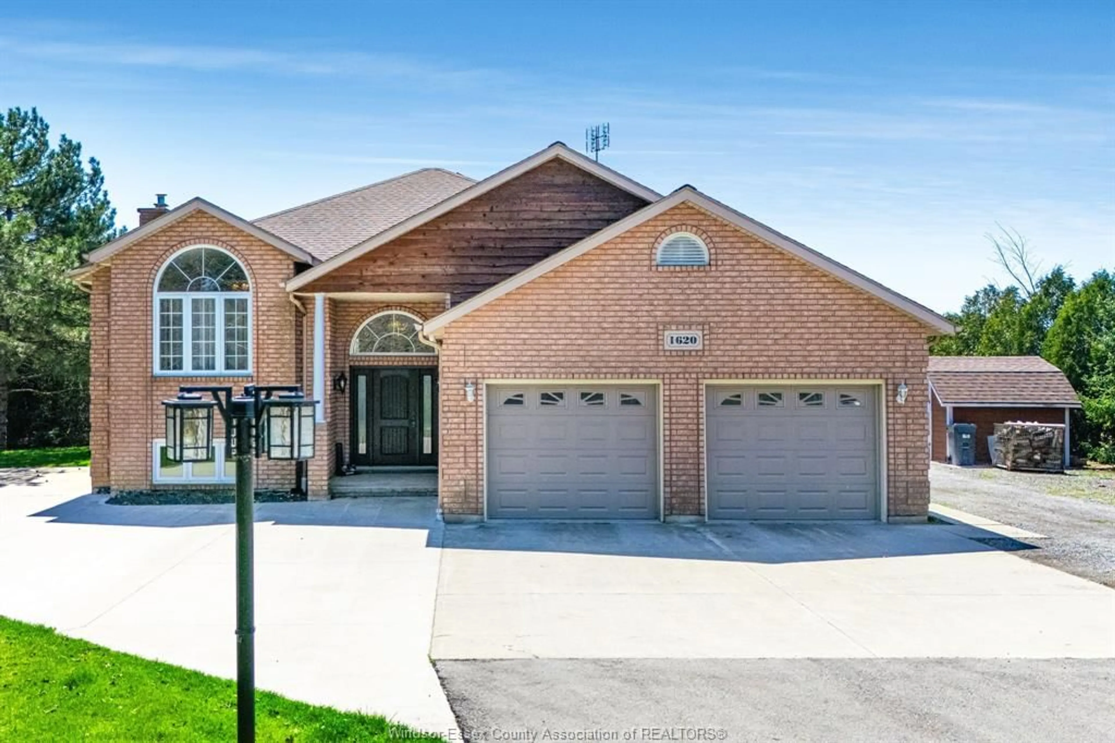 Home with brick exterior material, street for 1620 Deer Run, Leamington Ontario N8H 3V7