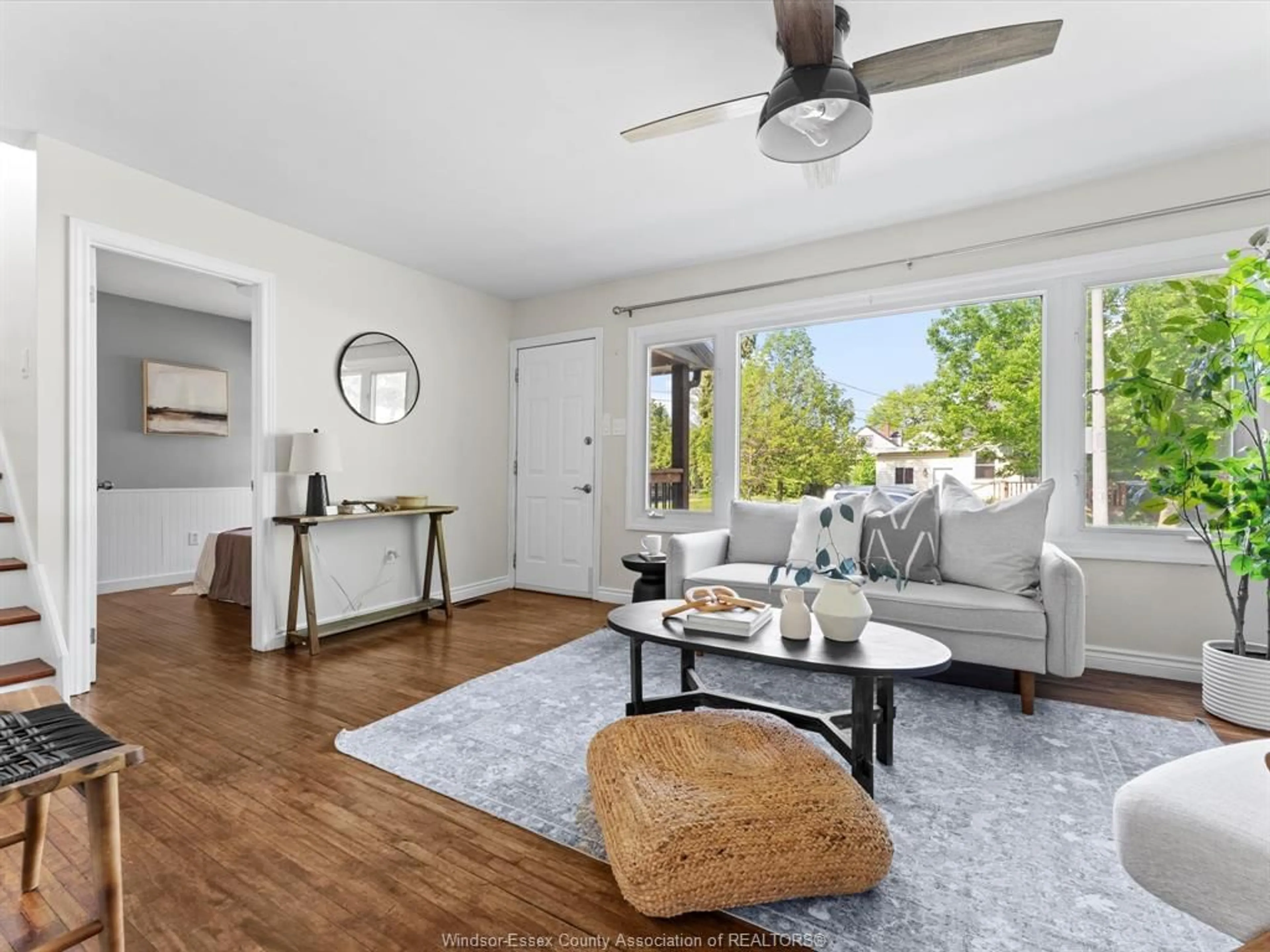 Living room with furniture, wood/laminate floor for 2394 LOUIS Ave, Windsor Ontario N8W 2B8