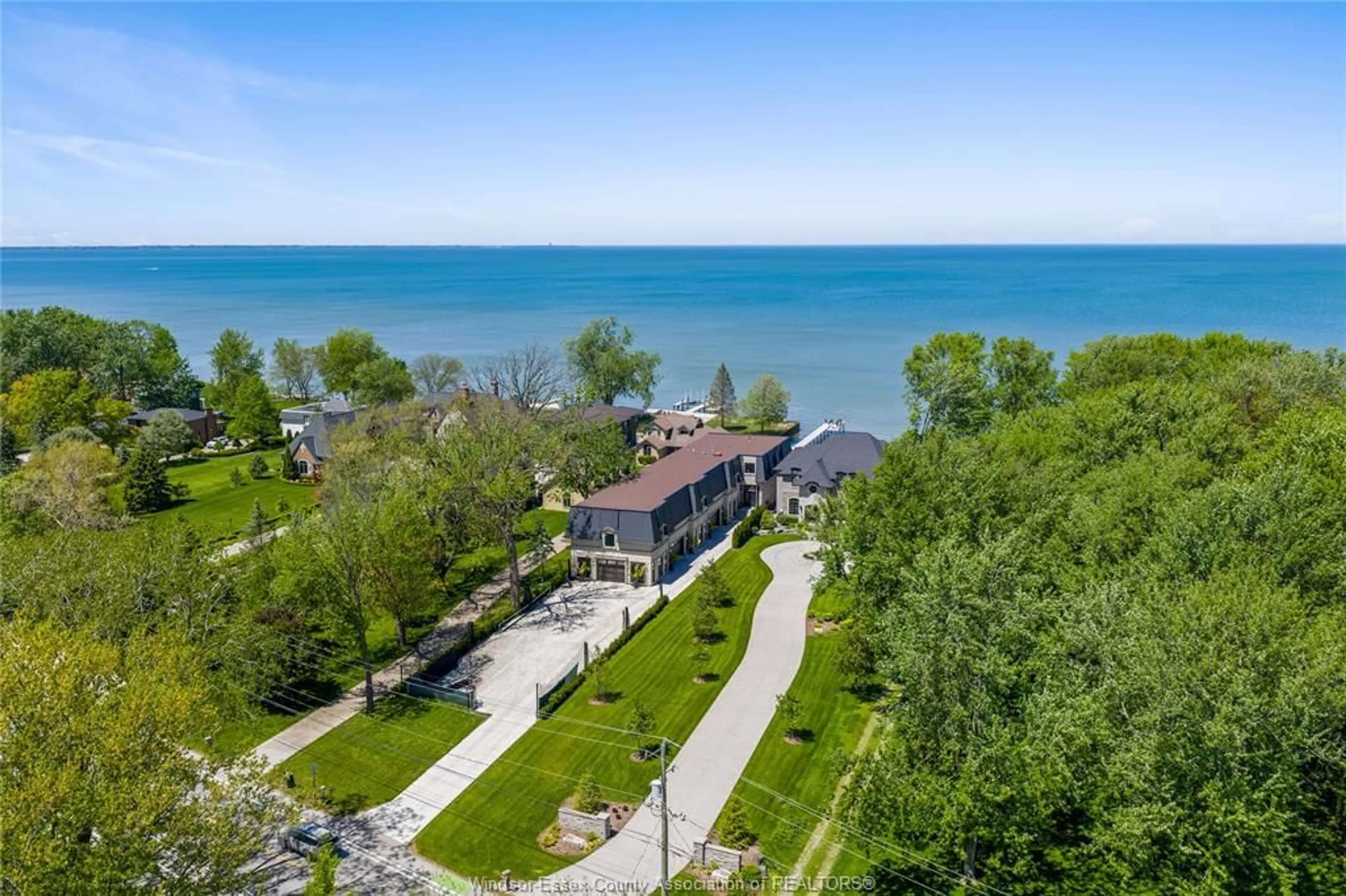 A pic from outside/outdoor area/front of a property/back of a property/a pic from drone, water/lake/river/ocean view for 888 OLD TECUMSEH Rd, Lakeshore Ontario N8L 0C2