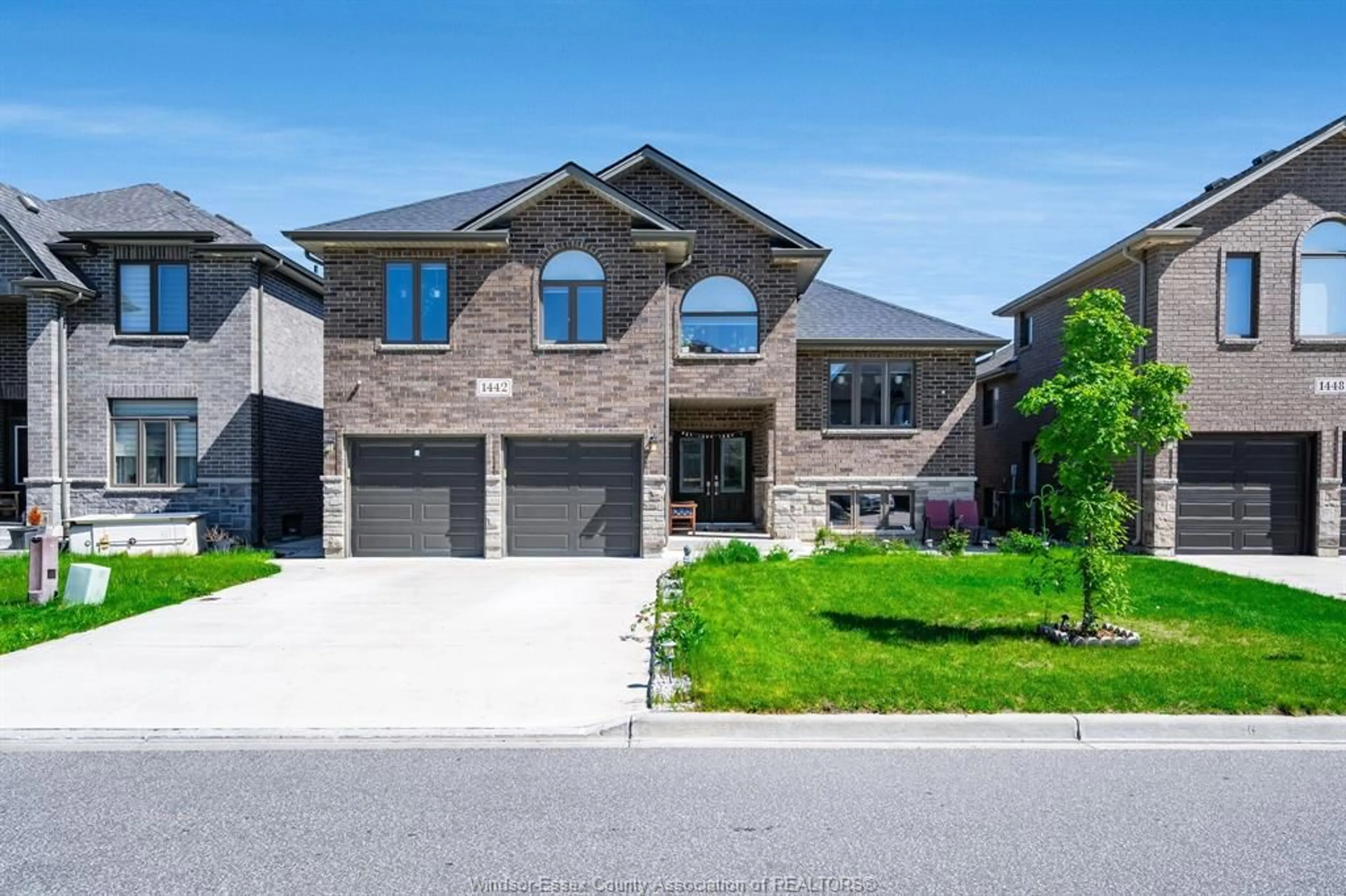 Home with brick exterior material, street for 1442 HELSINKI Crt, Windsor Ontario N9G 0B4
