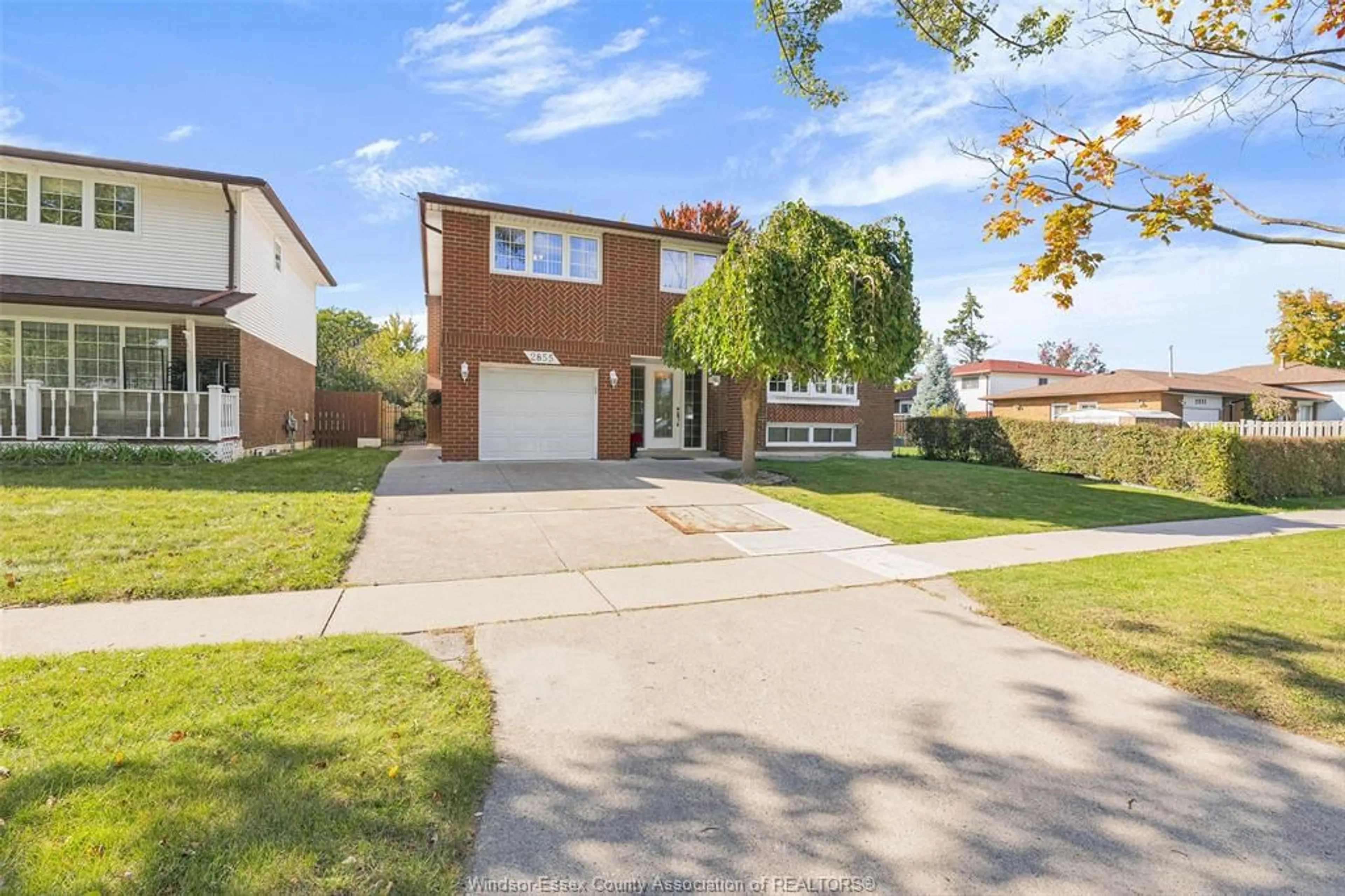 Home with brick exterior material, street for 2855 FOREST GLADE Dr, Windsor Ontario N8R 1L4