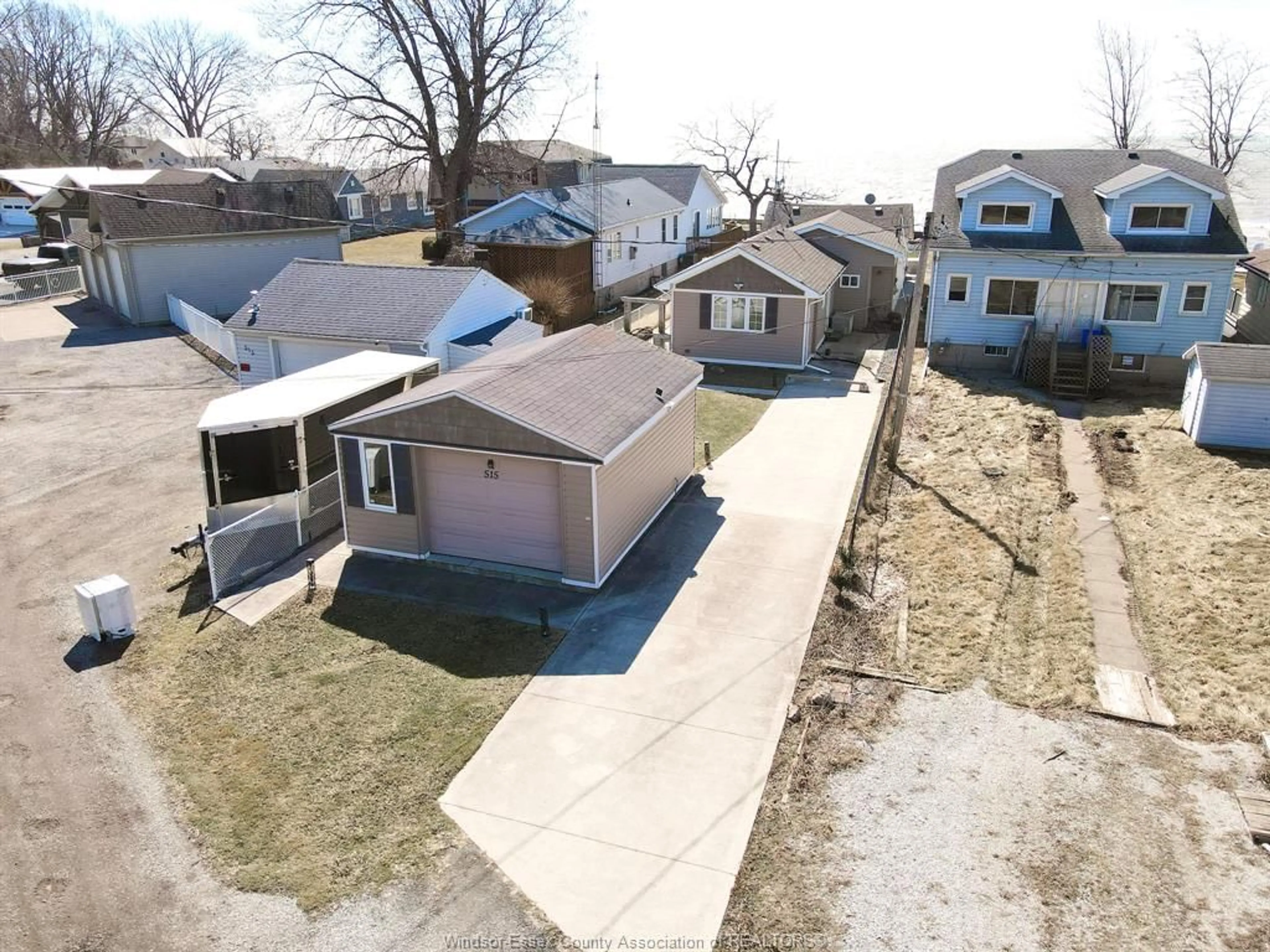 A pic from outside/outdoor area/front of a property/back of a property/a pic from drone, street for 515 LYPPS BEACH Rd, Colchester Ontario N0R 1G0