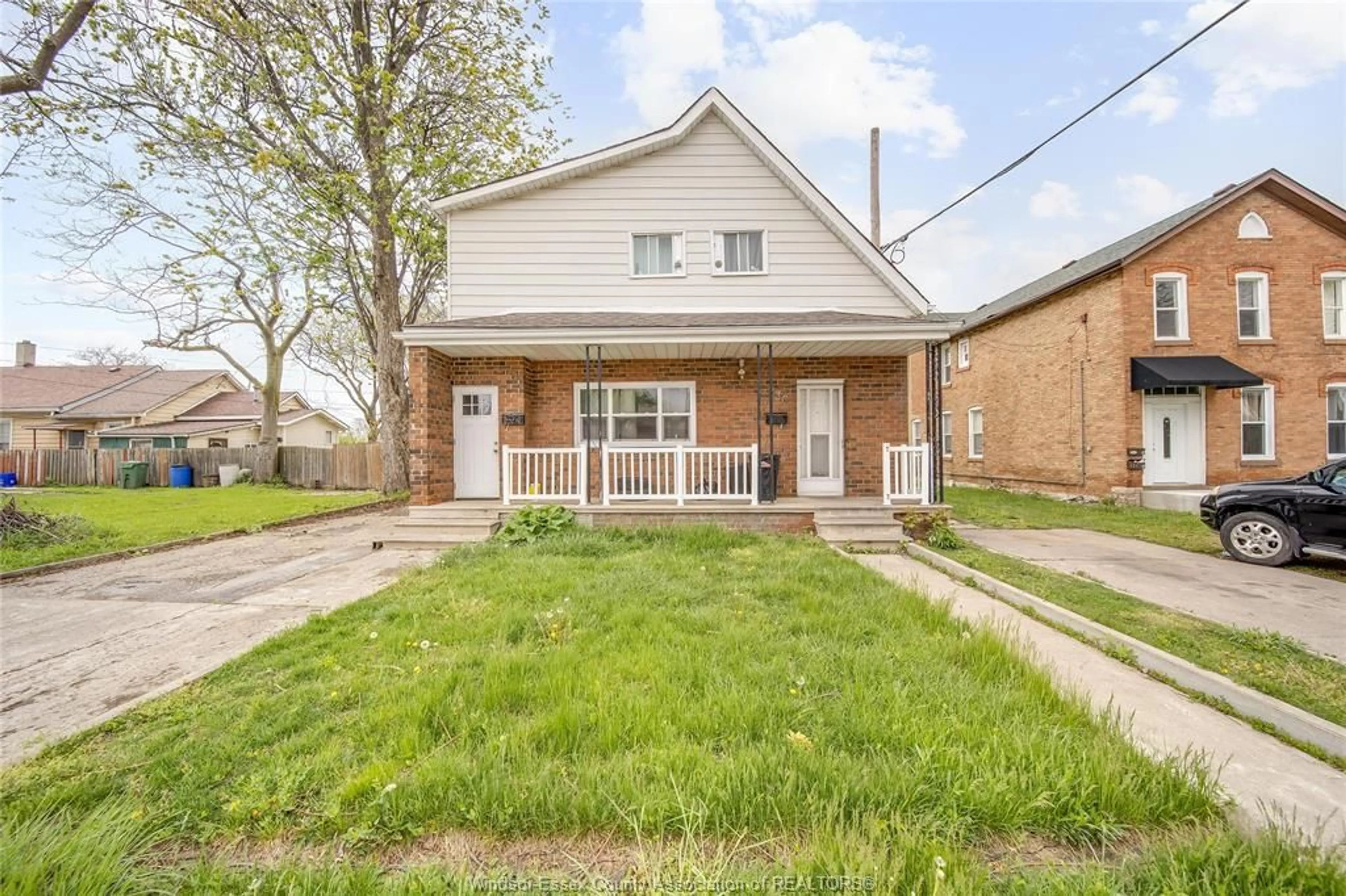 Home with brick exterior material, street for 736 UNIVERSITY Ave, Windsor Ontario N9A 2Z7
