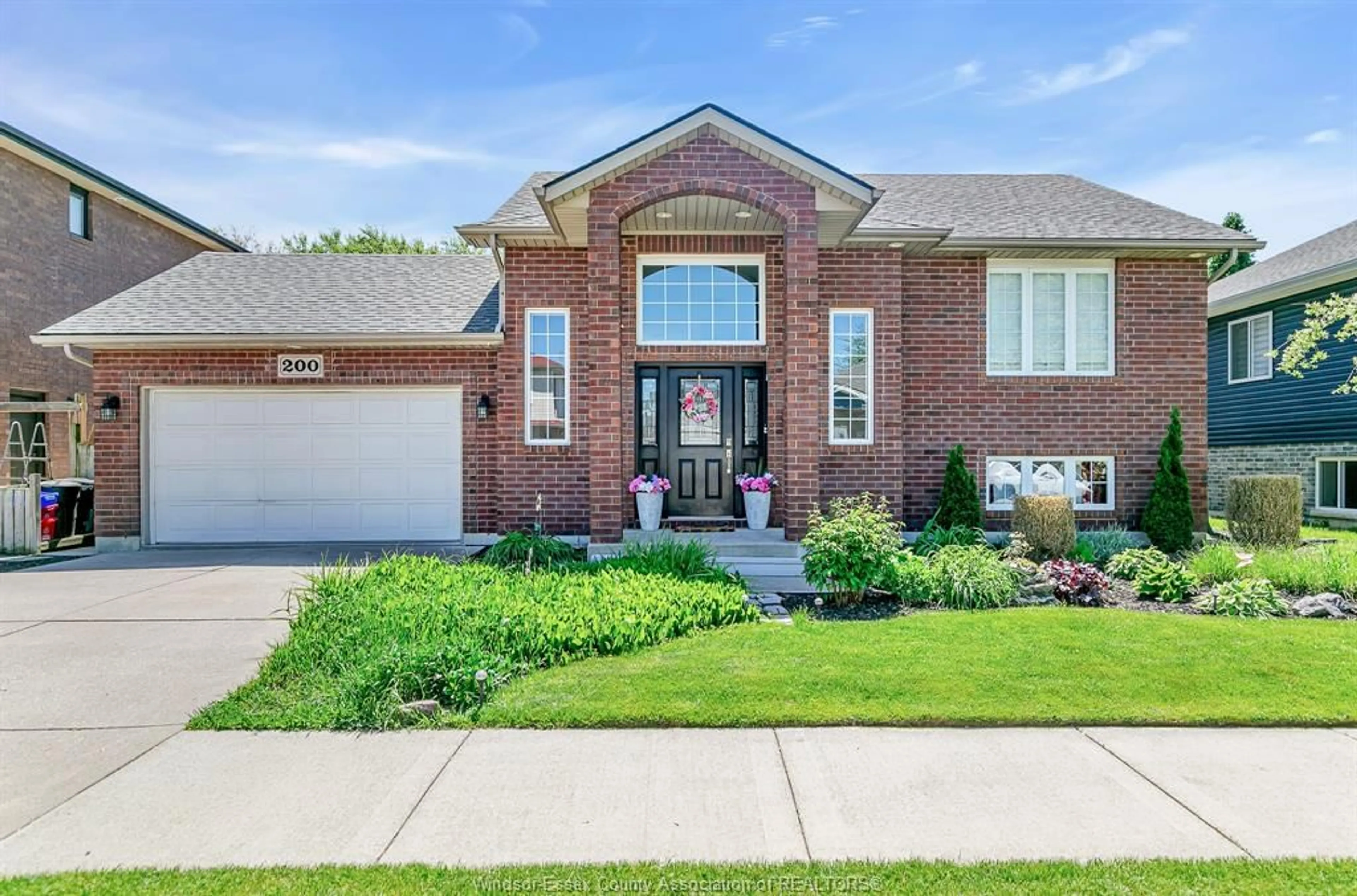 Home with brick exterior material, street for 200 RIVERVIEW Ave, LaSalle Ontario N9J 3Y1