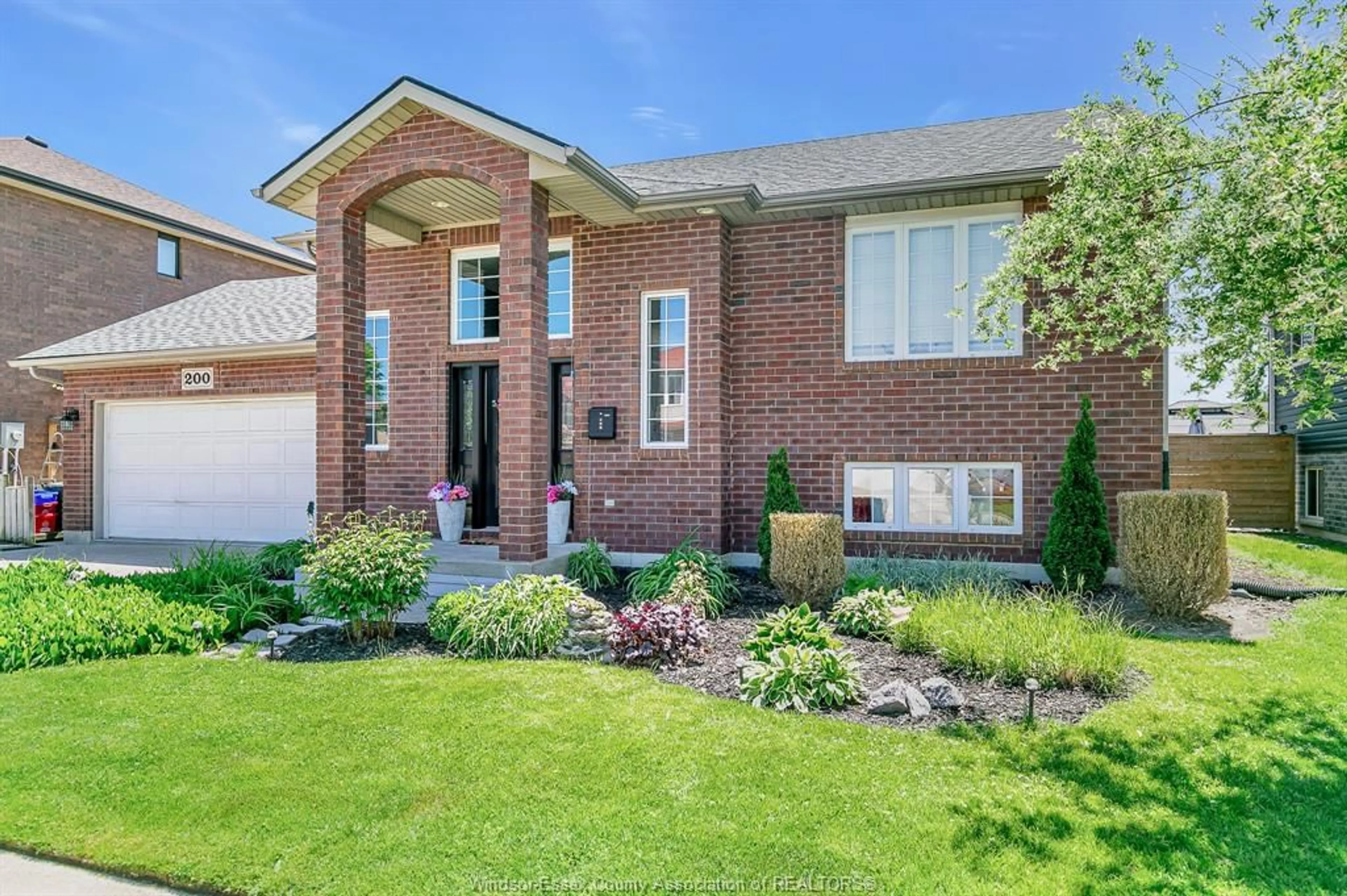 Home with brick exterior material, street for 200 RIVERVIEW Ave, LaSalle Ontario N9J 3Y1