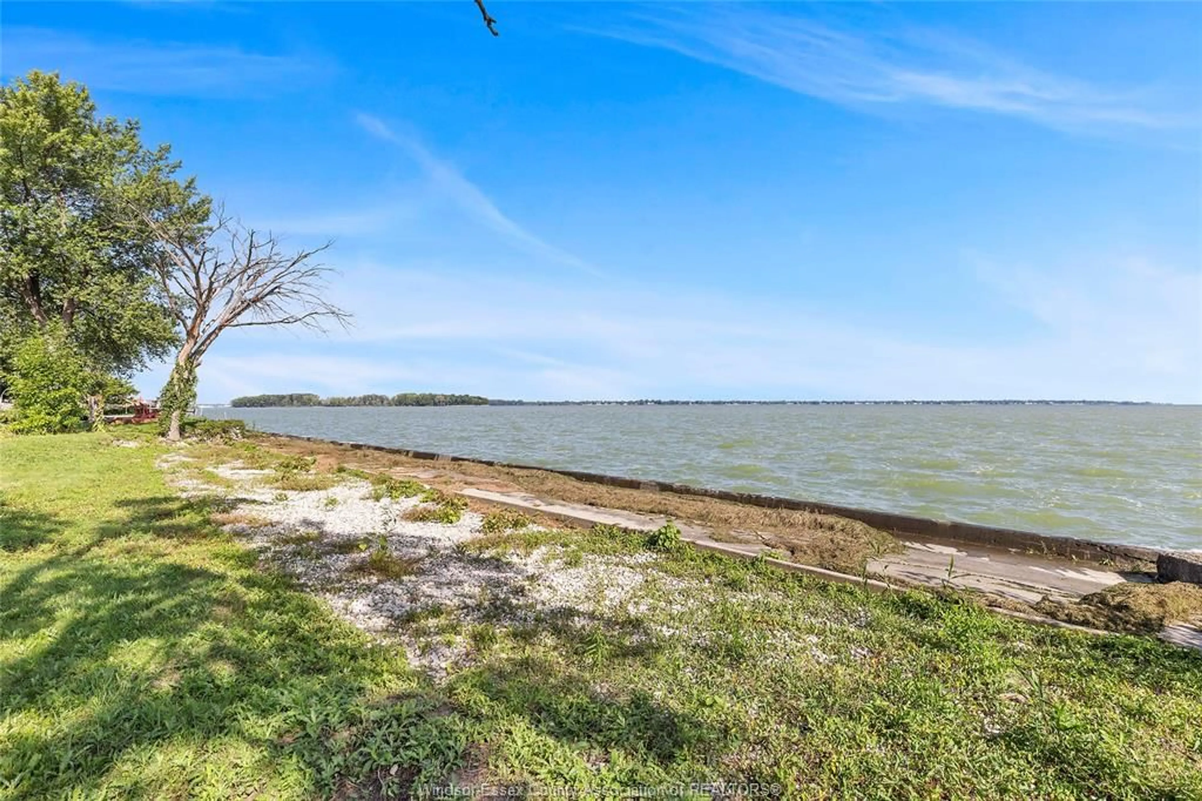 A pic from outside/outdoor area/front of a property/back of a property/a pic from drone, water/lake/river/ocean view for 11280 RIVERSIDE Dr, Windsor Ontario N8P 1A4
