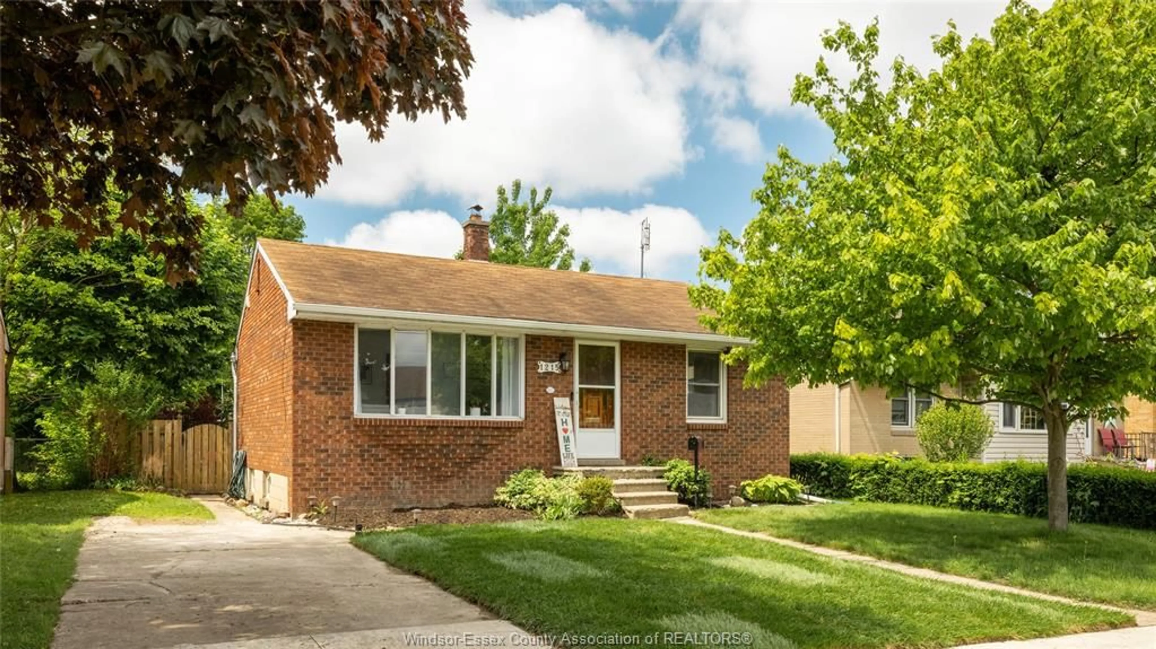 Home with brick exterior material, street for 1215 DOT Ave, Windsor Ontario N9C 3H9